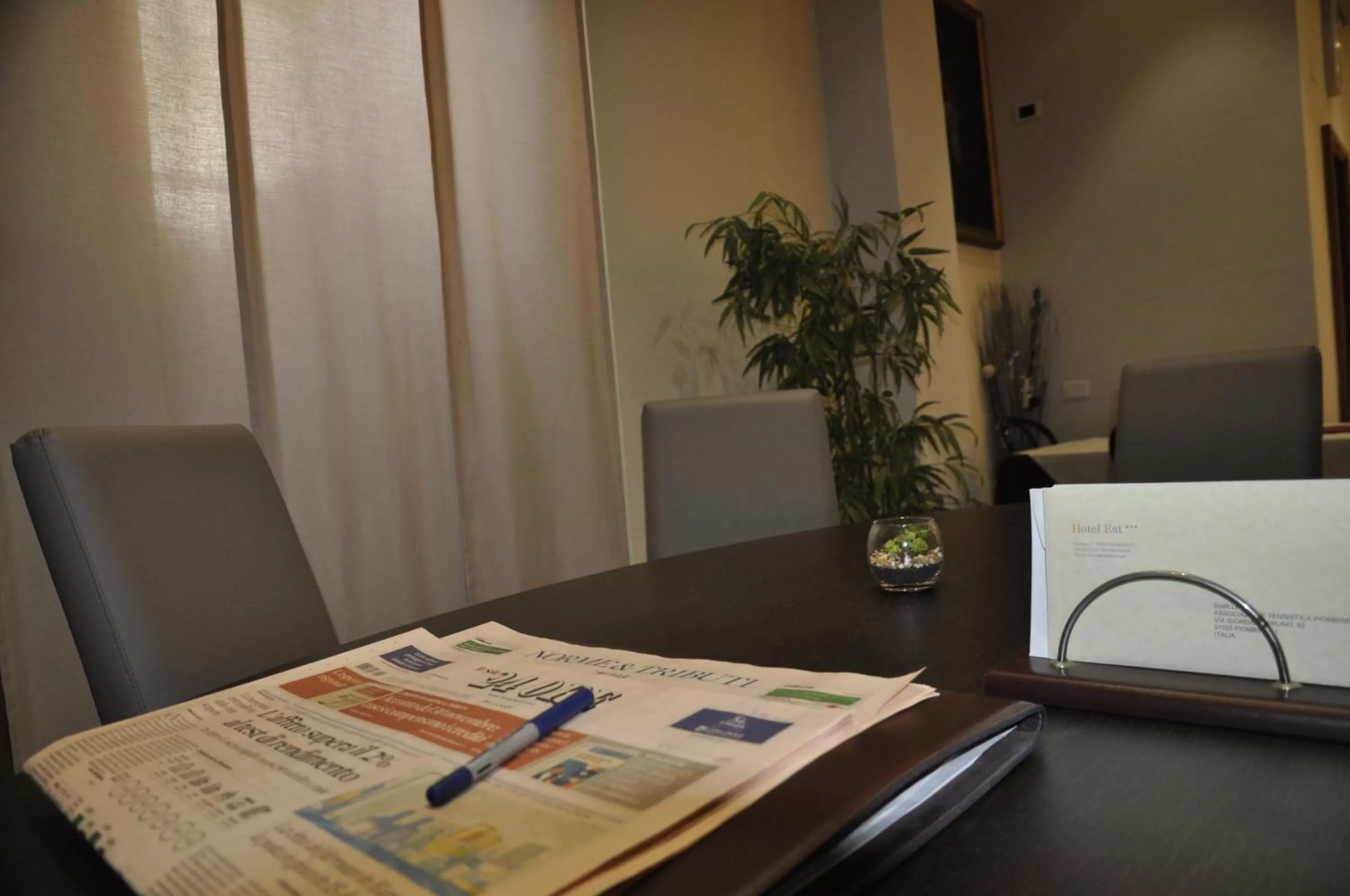 Communal lounge/ TV room in Hotel Est Piombino