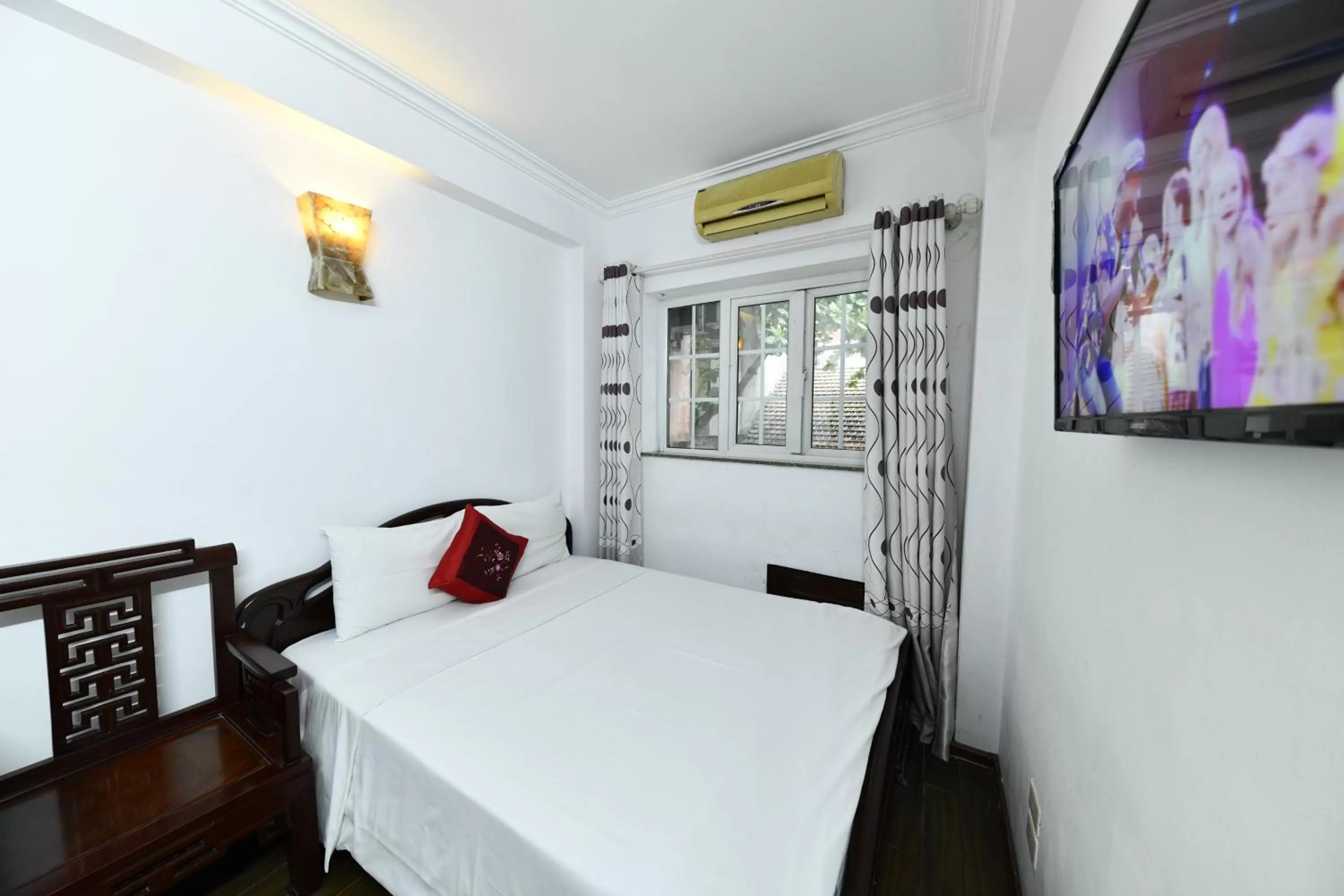 Bed in Phoenix Legend Hotel Hanoi