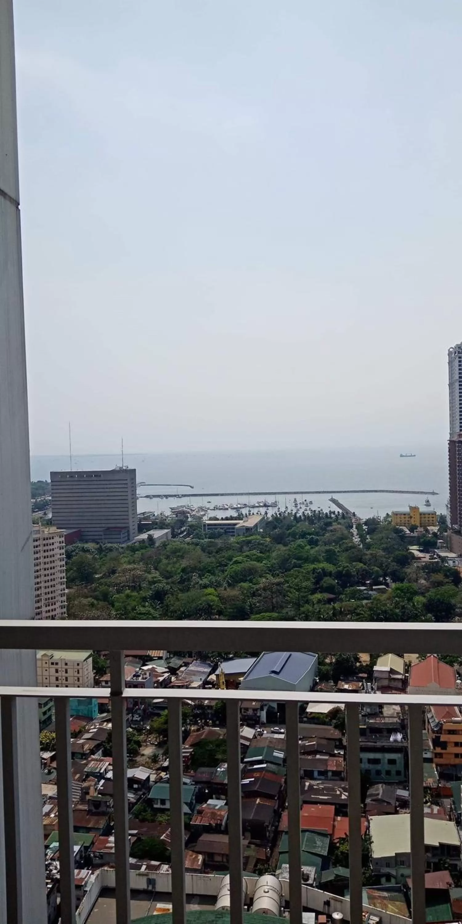 Balcony/Terrace in Green Residences Stays by PBYY