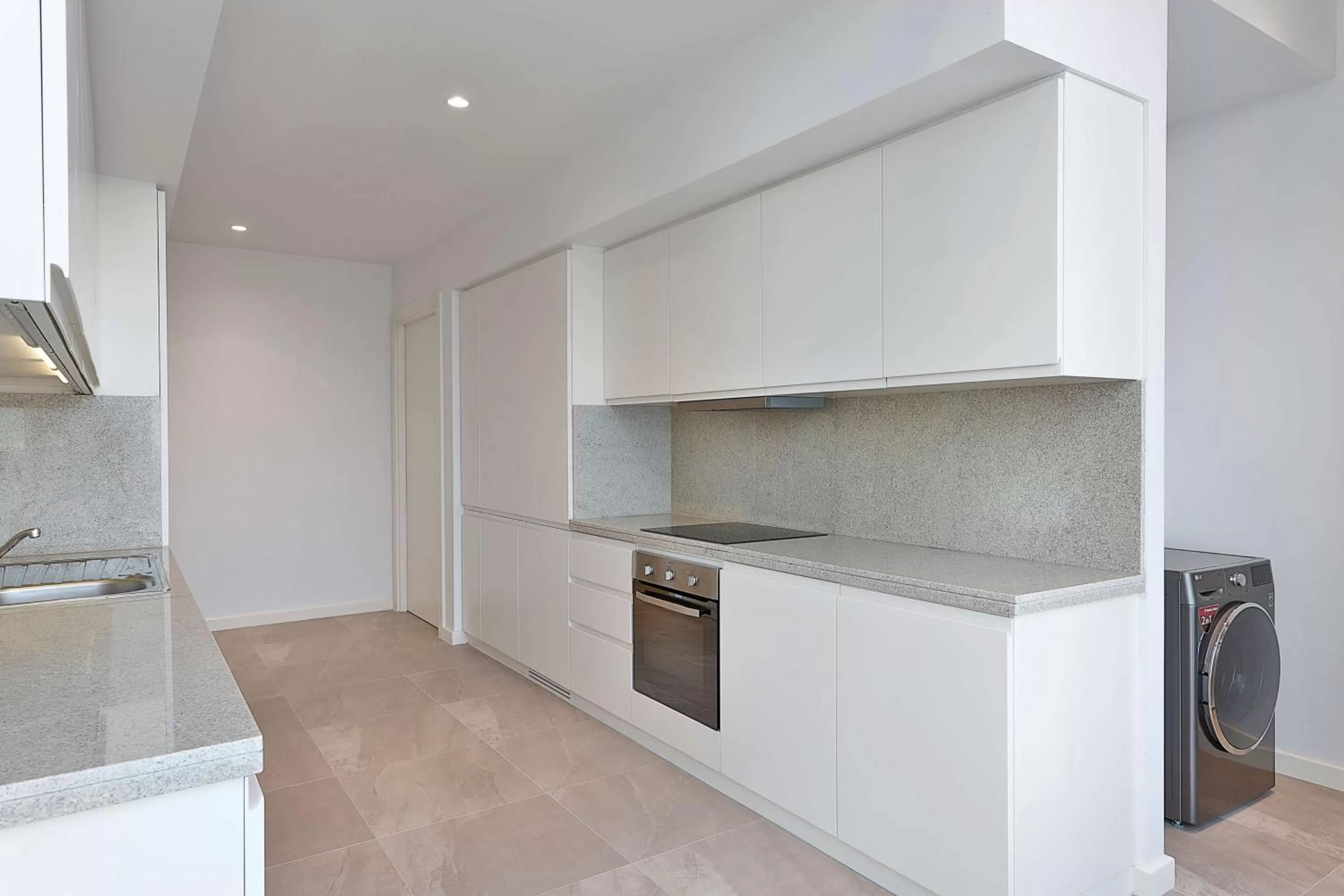 Kitchen or kitchenette in Aleph Doha Residences, Curio Collection By Hilton