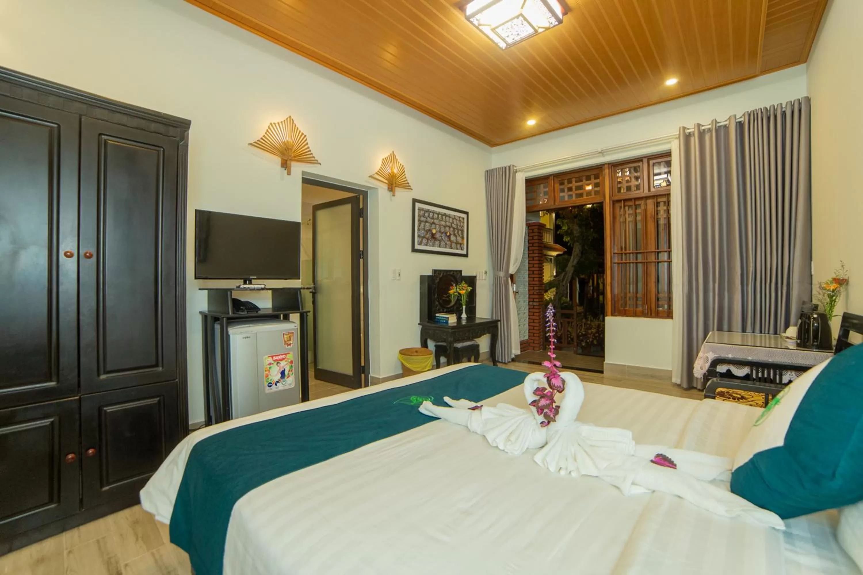 TV and multimedia, Bed in Betel Garden Villa