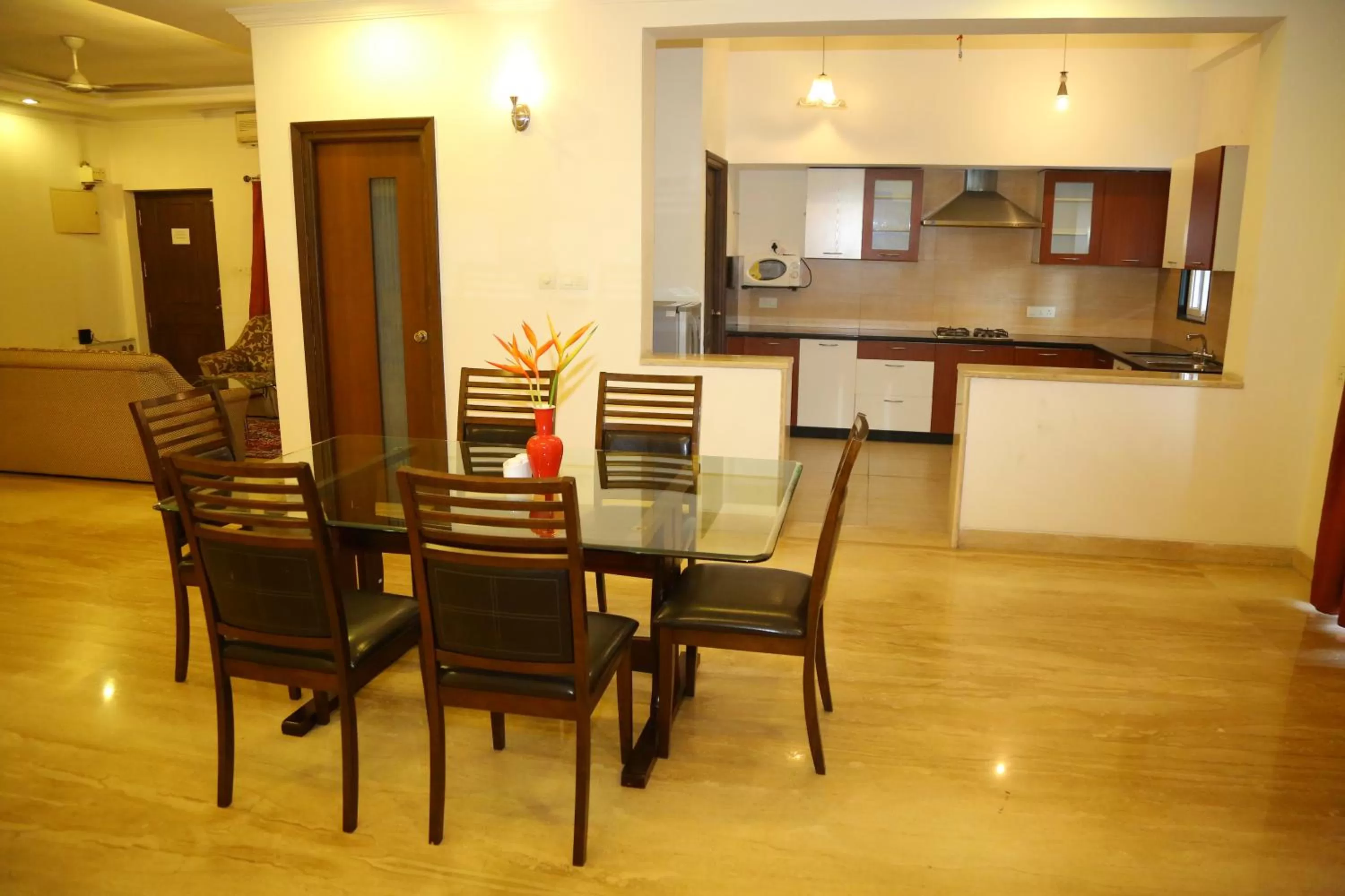 Kitchen or kitchenette, Dining Area in Swan Suites Madhapur