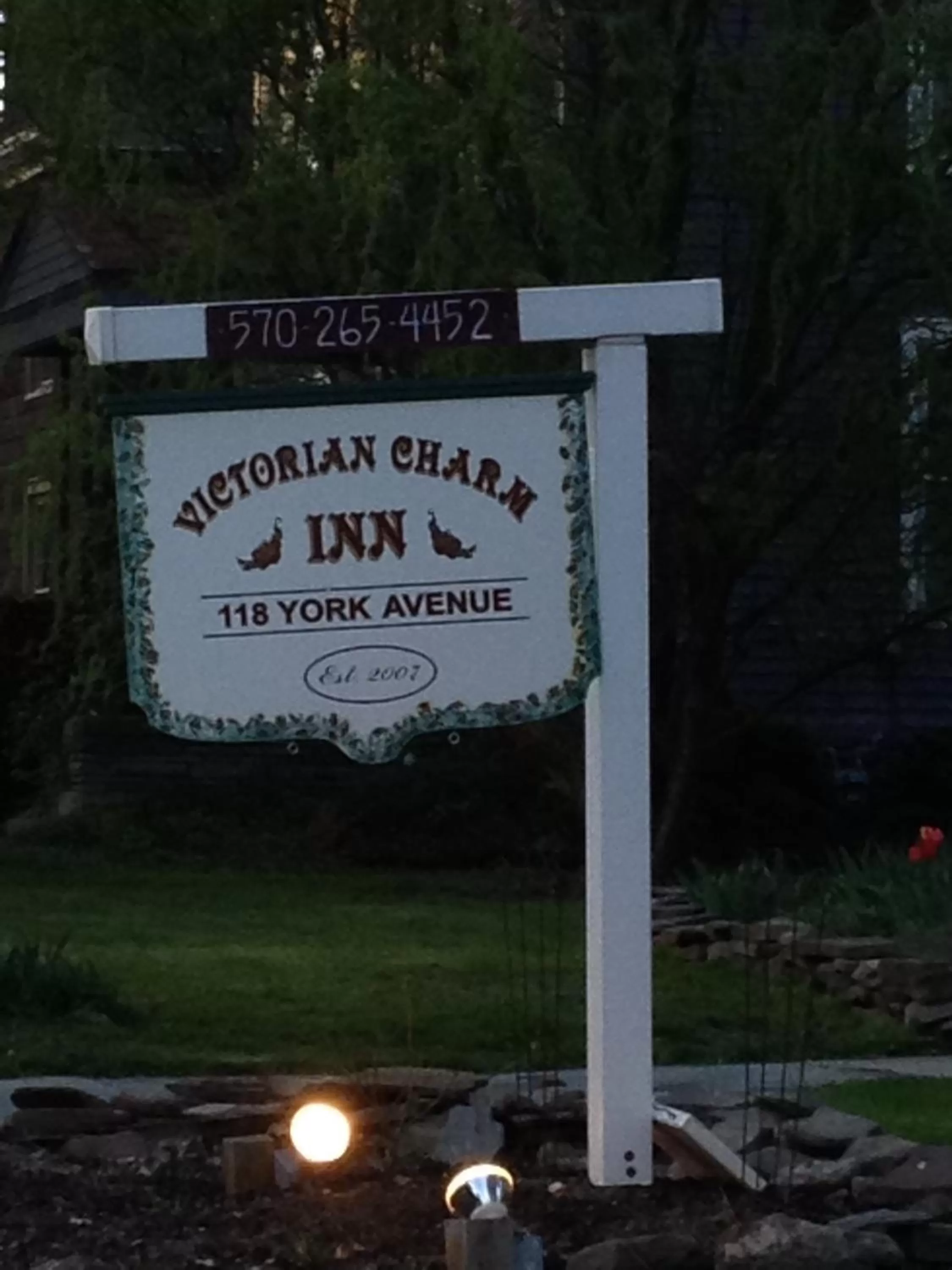 Property logo or sign in Victorian Charm Inn