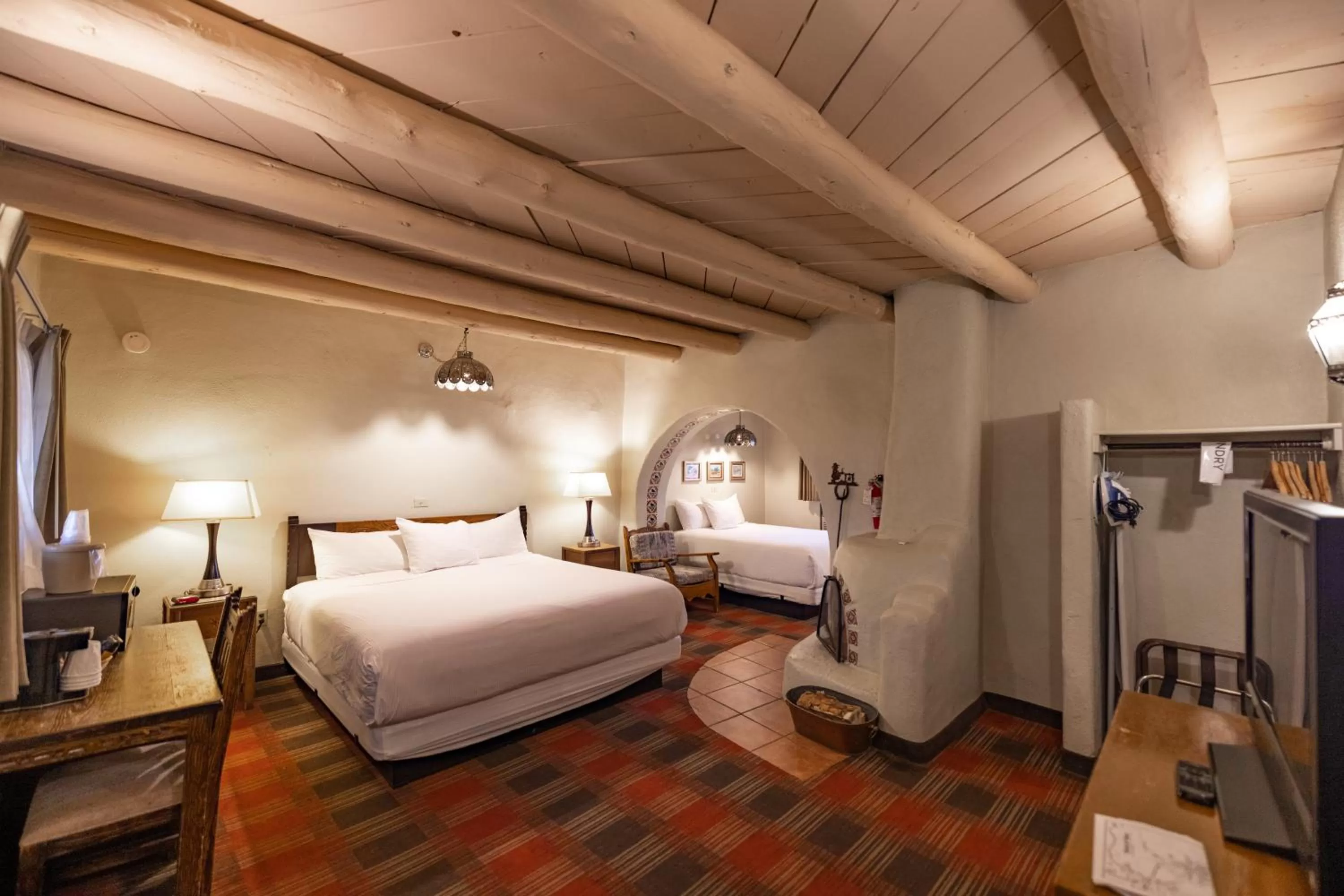 Bed in Sagebrush Inn & Suites