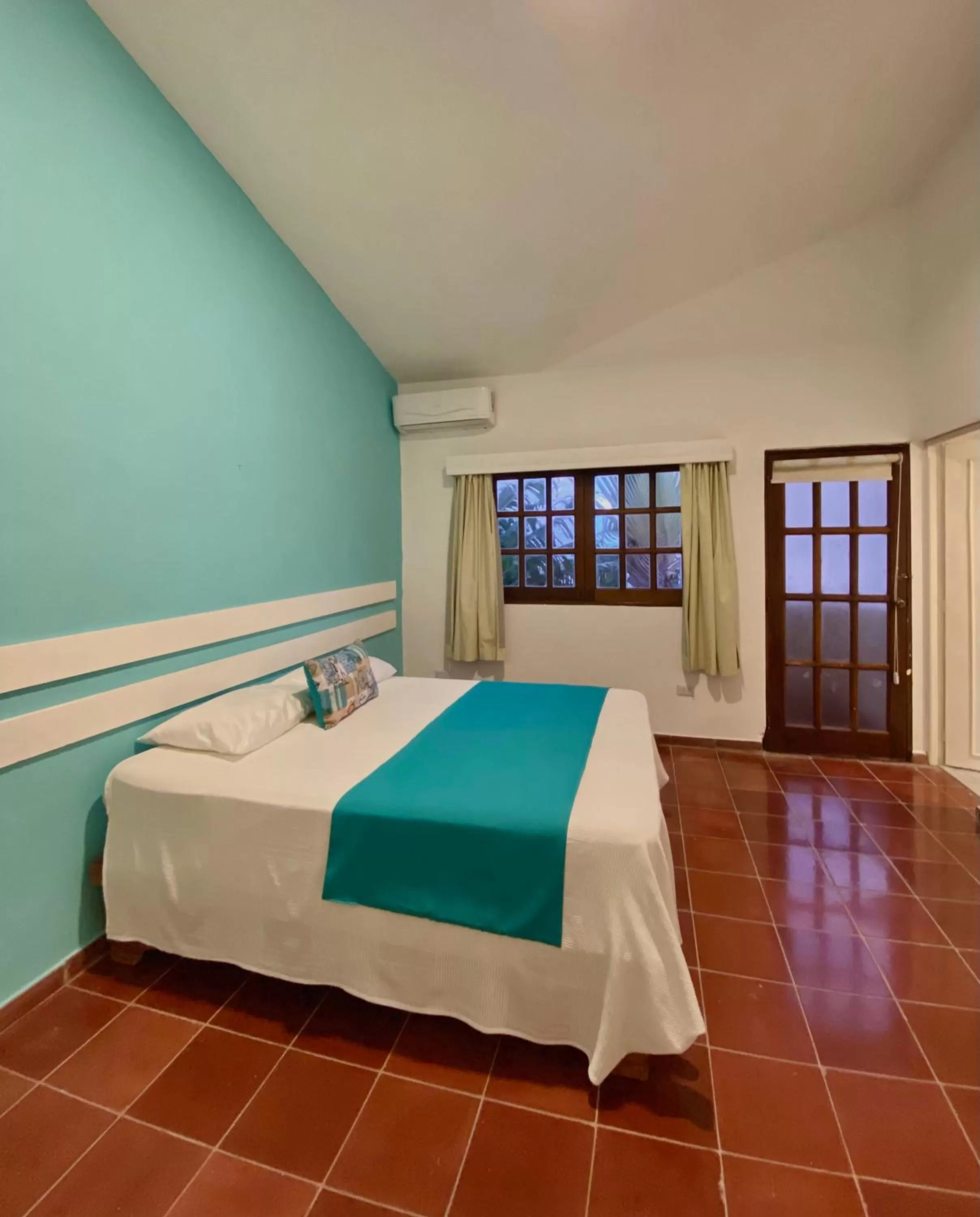 Bed in Calypso Beach Hotel by The Urbn House Santo Domingo Airport