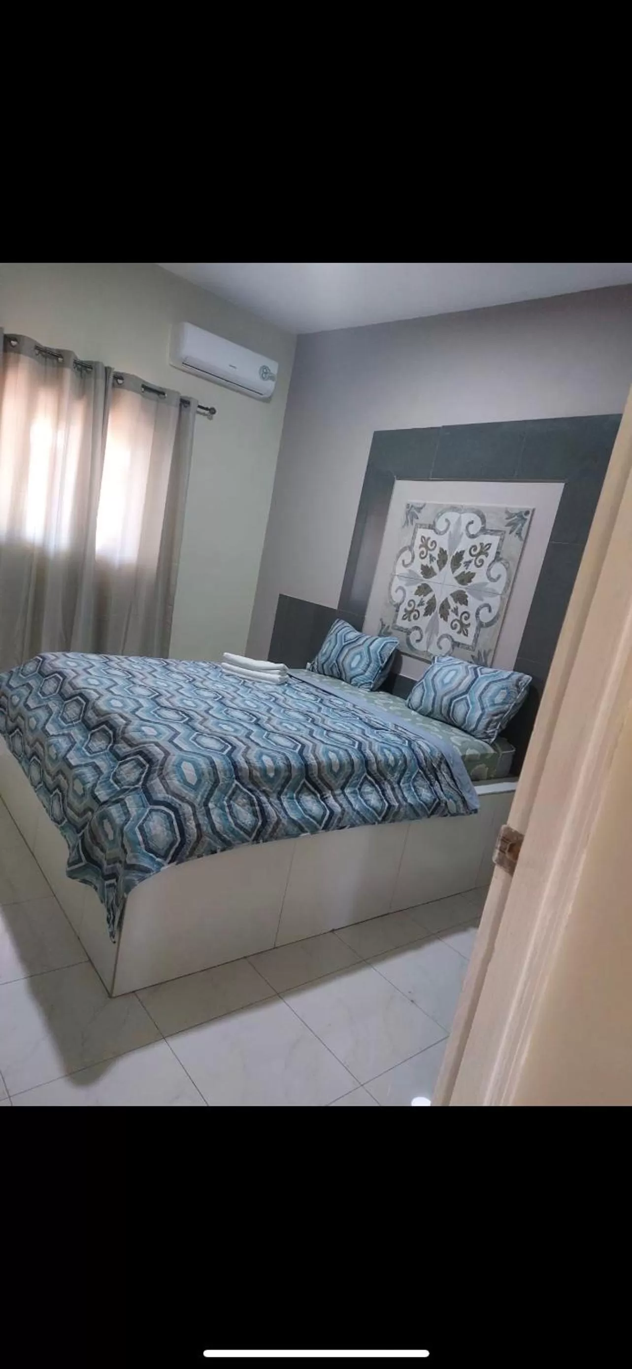 Bed in Curasita colour Appartments