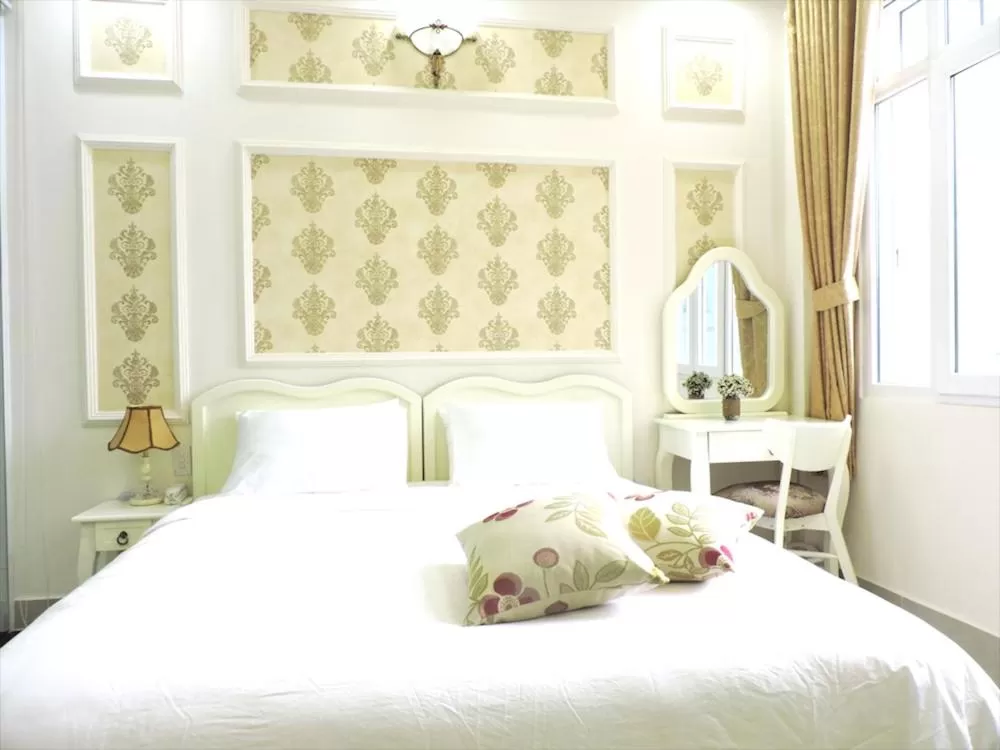 Bed in Chez Lotus Rose