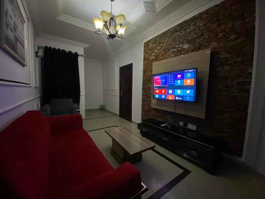 Living room, TV/Entertainment Center in Palazzo Apartments