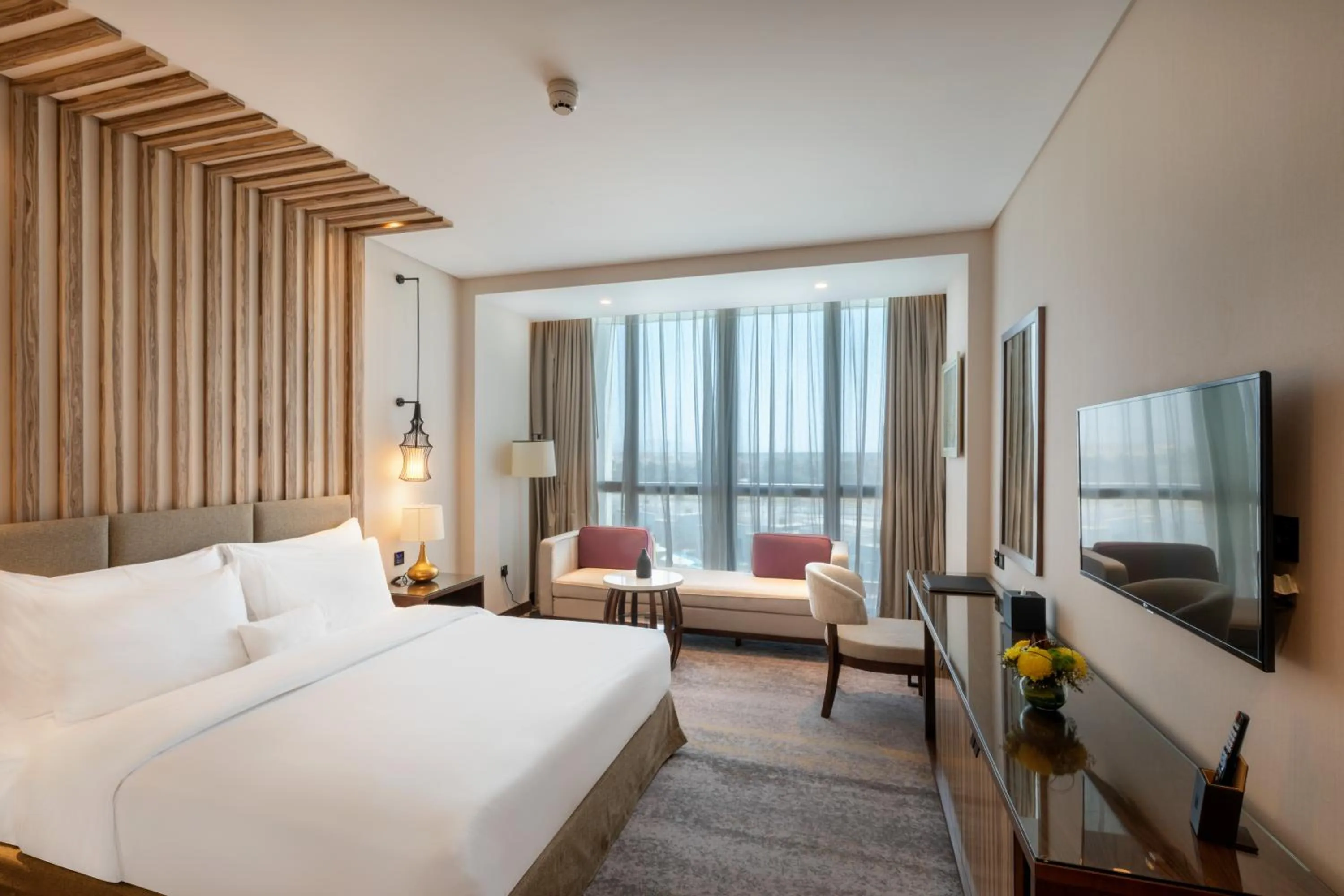 Bedroom, Bed in Millennium Resort Salalah