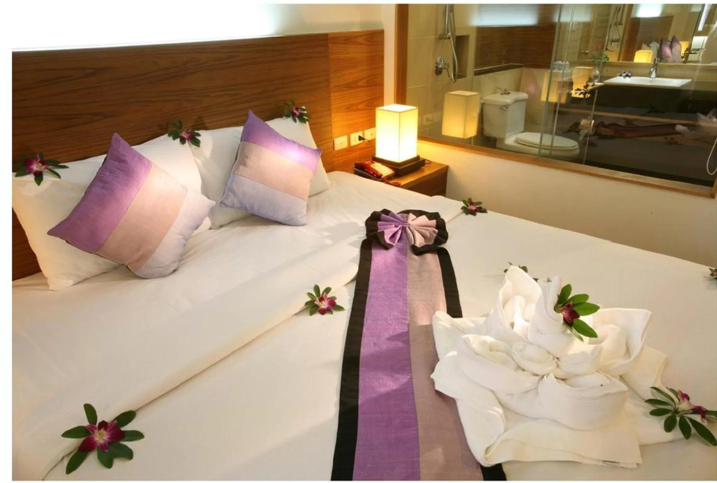 Bed in Baan Saikao Plaza Hotel & Service Apartment
