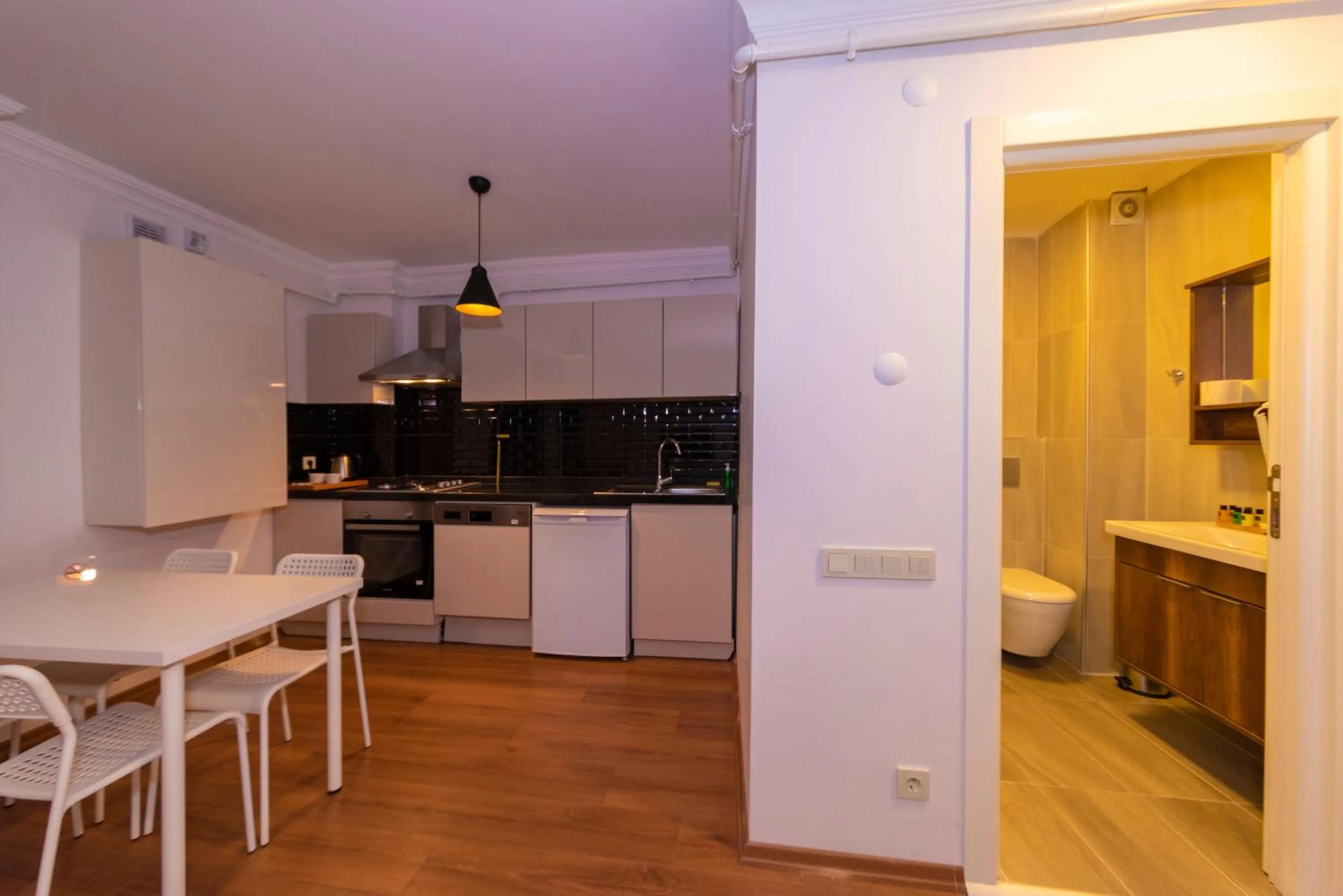 Kitchen or kitchenette in Joy Suites