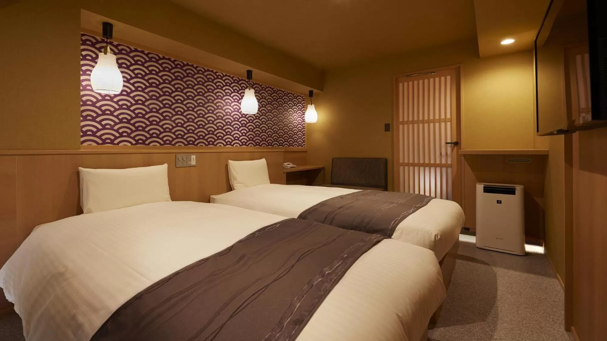 Bed in Sakura Sky Hotel