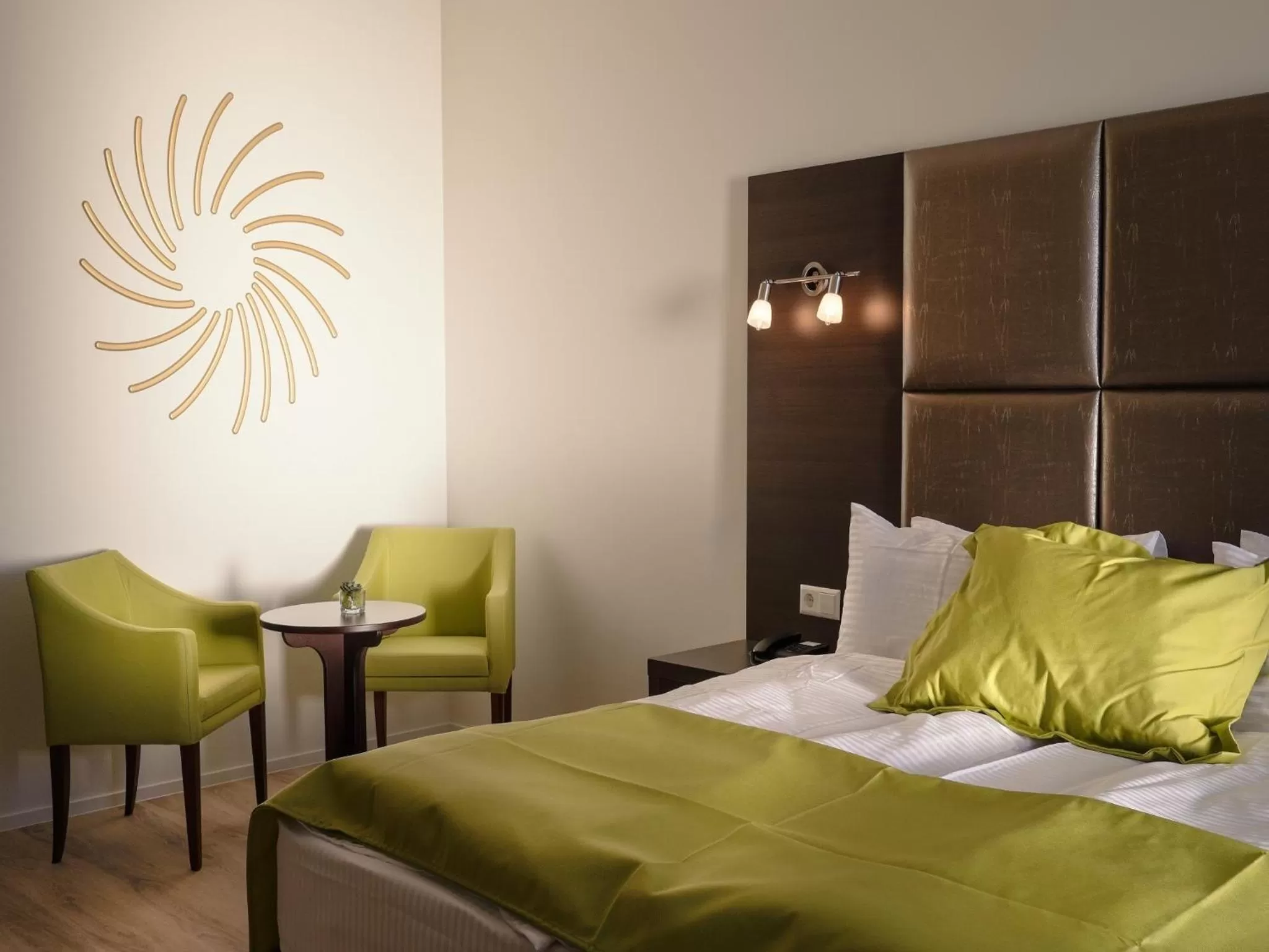 Photo of the whole room, Bed in Boutique Hotel Bellevue Rheinfelden / Basel