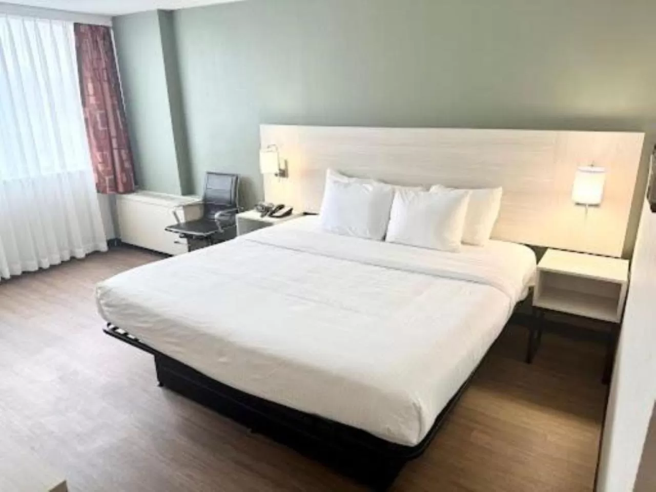 Bed in Quality Inn & Suites East Syracuse - Carrier Circle