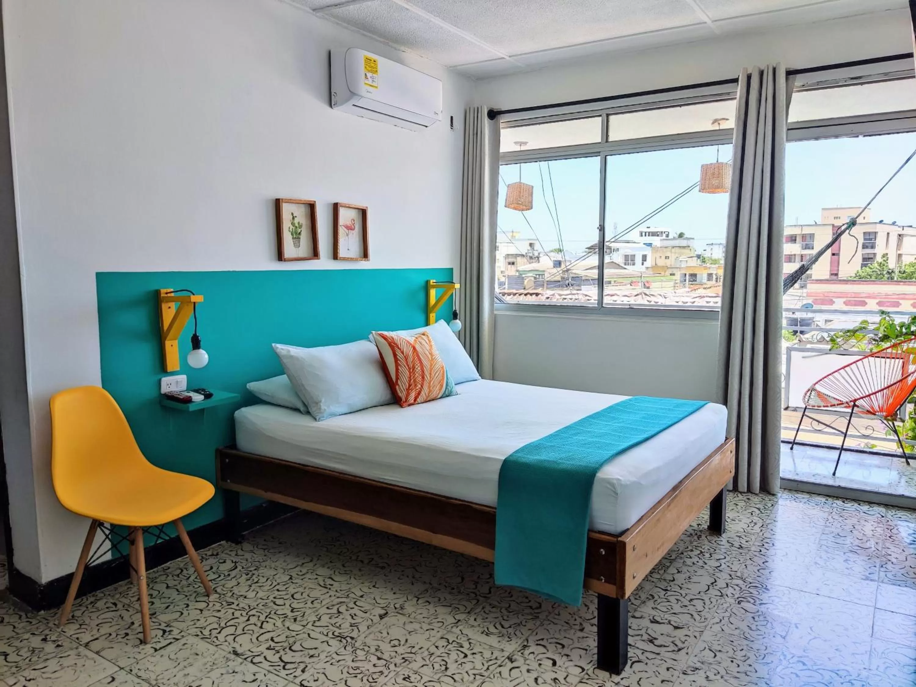 Bed in Bona Vida Hotel