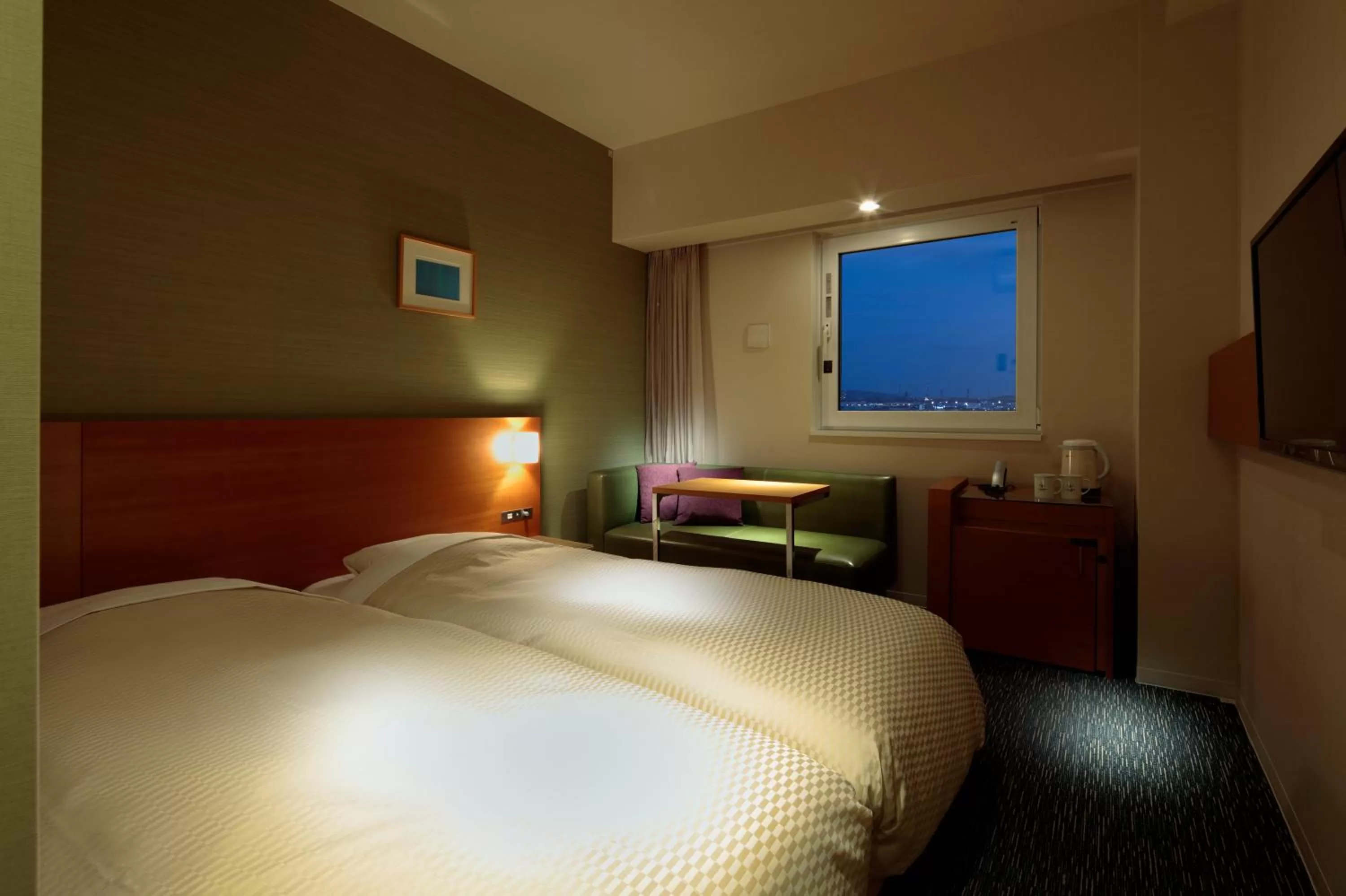 Bed in Candeo Hotels Fukuyama