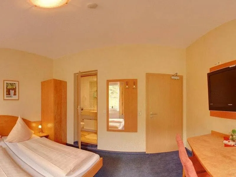 Photo of the whole room, Bed in Stumbergers Hotel - free parking -