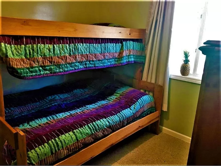 Bed in Gold Coast Family Cottages