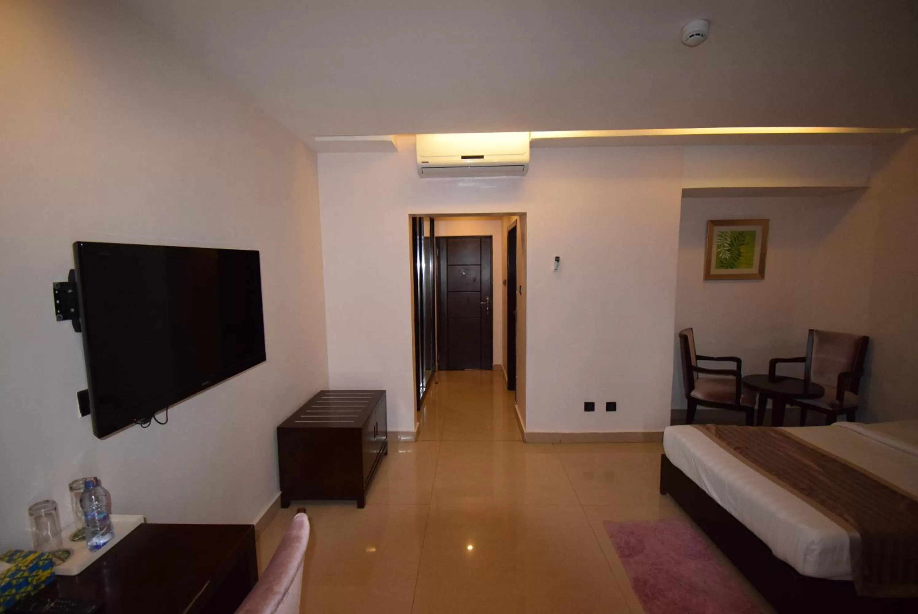 Bedroom, Seating Area in Noble House Hotel