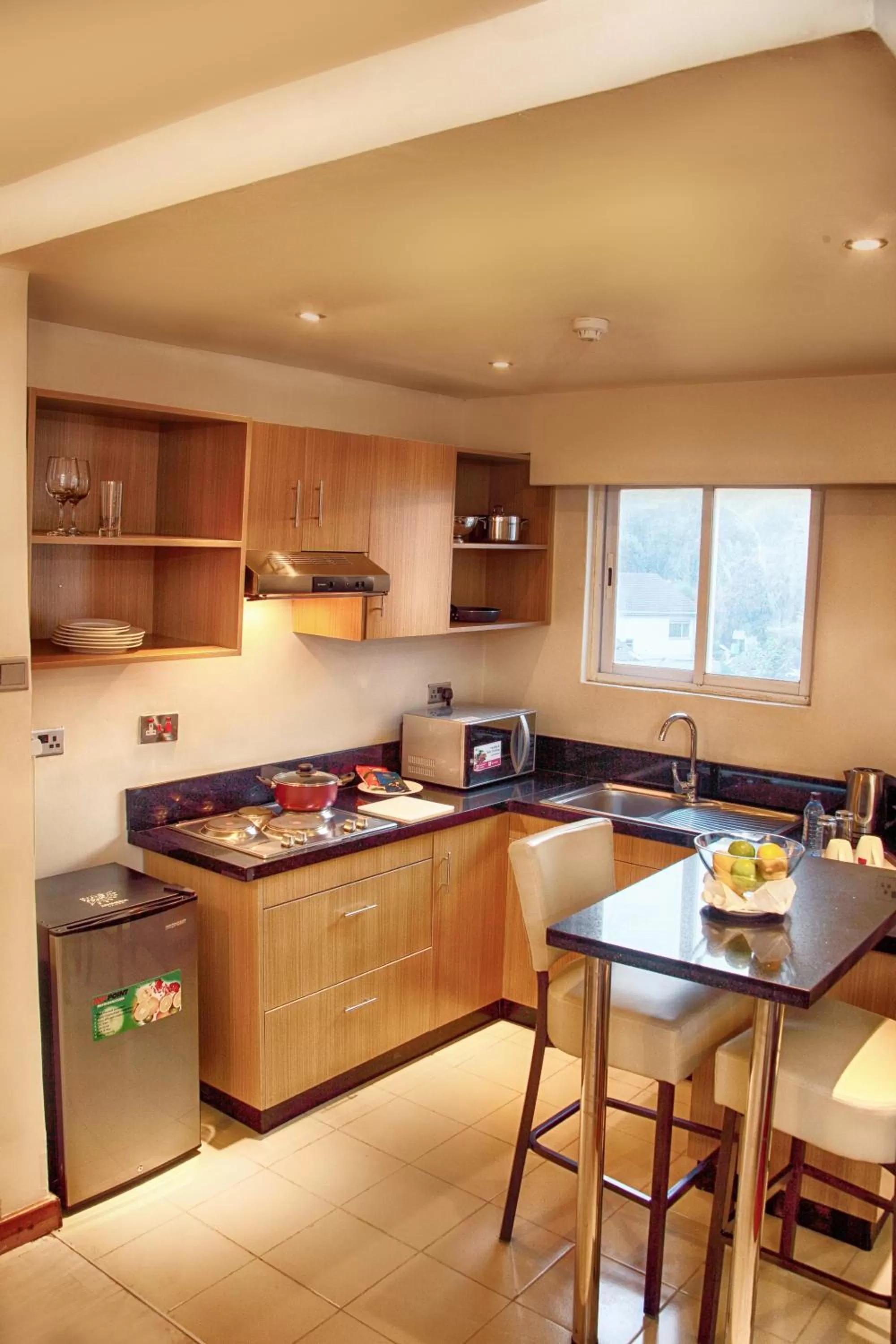 Kitchen or kitchenette in The Zehneria Hotel