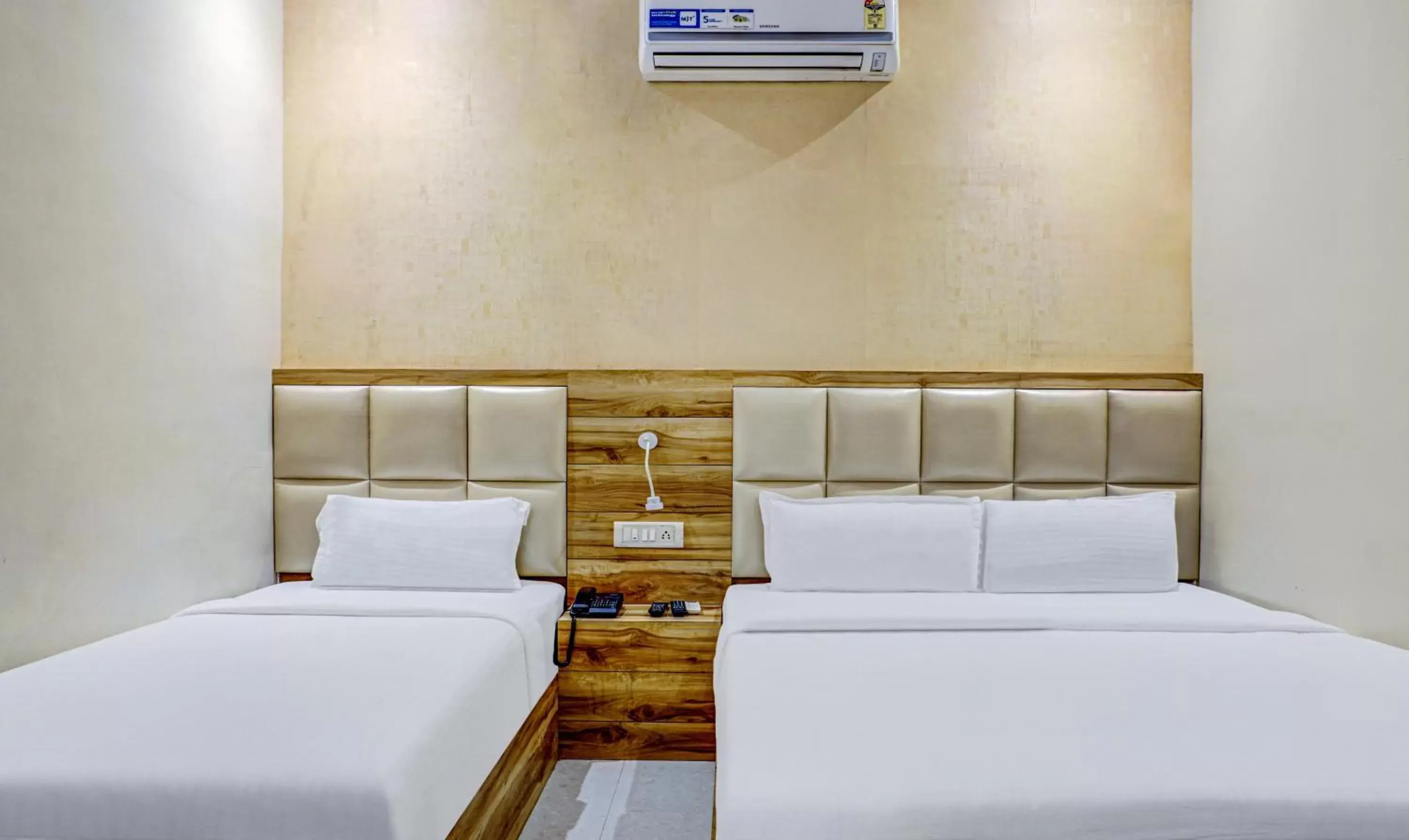 Standard Quadruple Room - 10% discount on food and soft beverage in Hotel Sun City - Near Saifee Hospital And H N Reliance Hospital Standard Quadruple Room - 10% discount on food and soft beverage in Hotel Sun City - Near Saifee Hospital And H N Reliance Hospital
