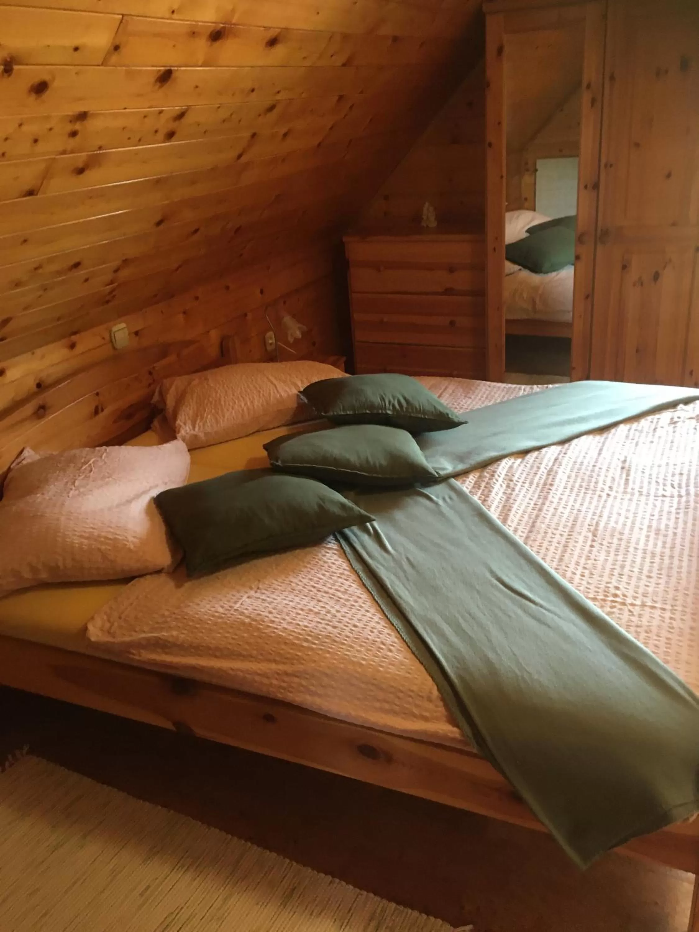 Bed in Korošec Apartments and Wellness Centre