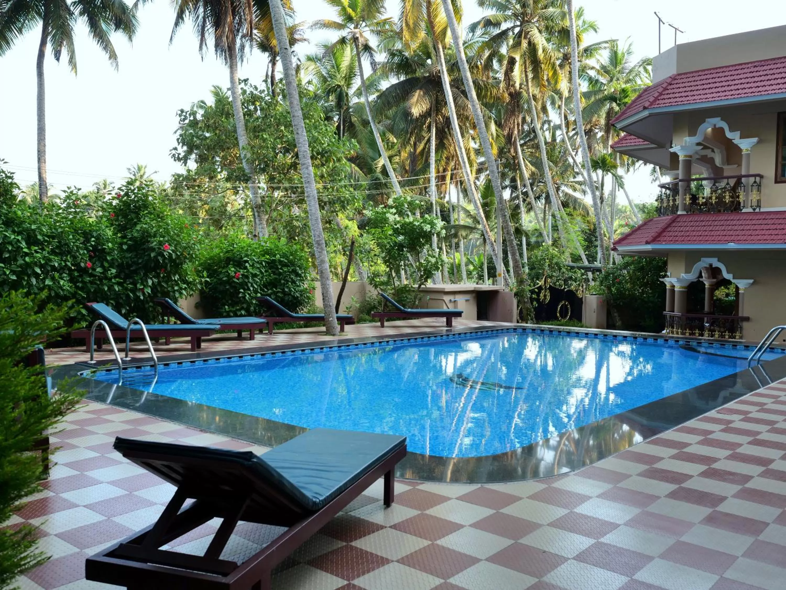 Swimming pool in Ganesh Ayurveda Holiday Home