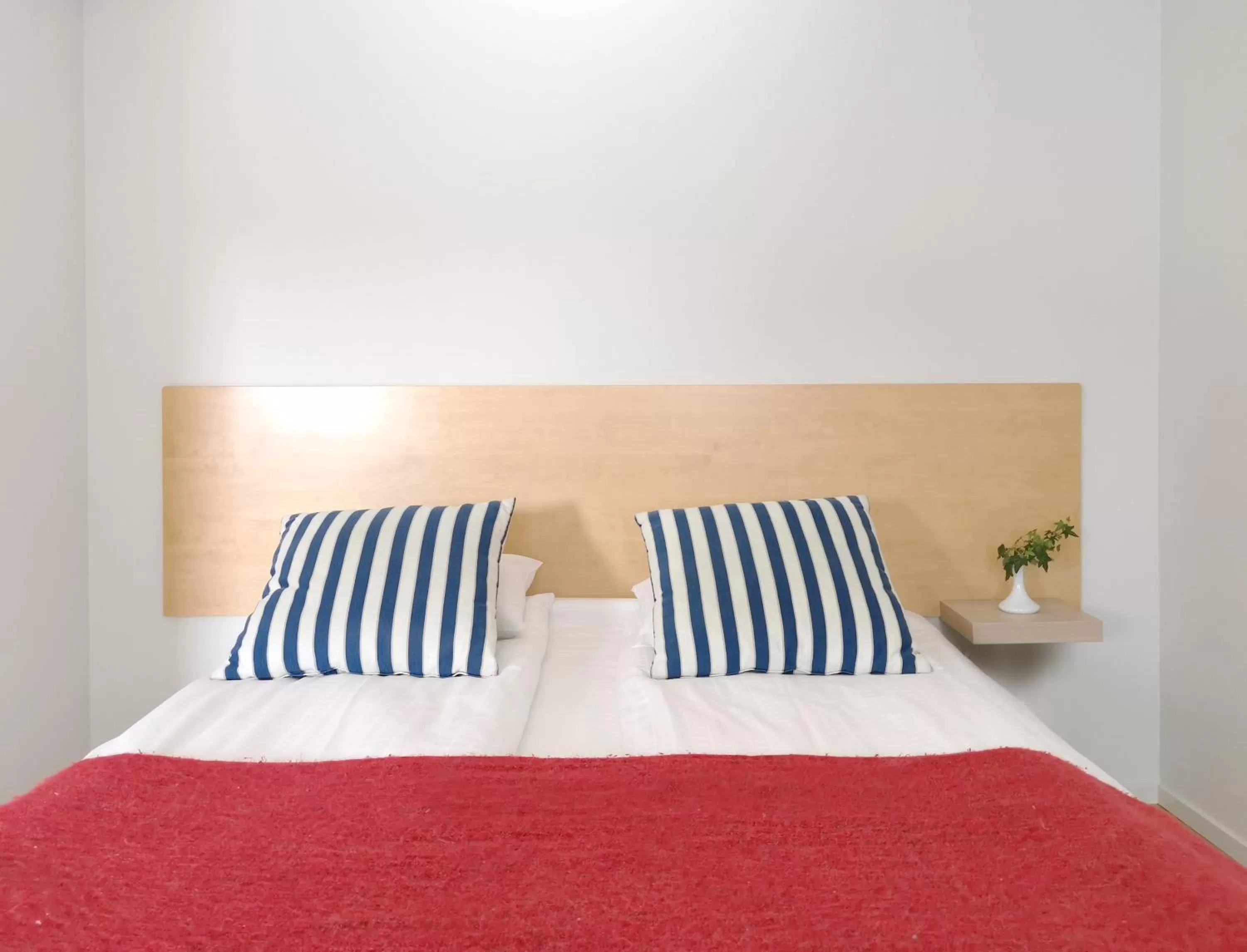 Bed in 2Home Hotel Apartments