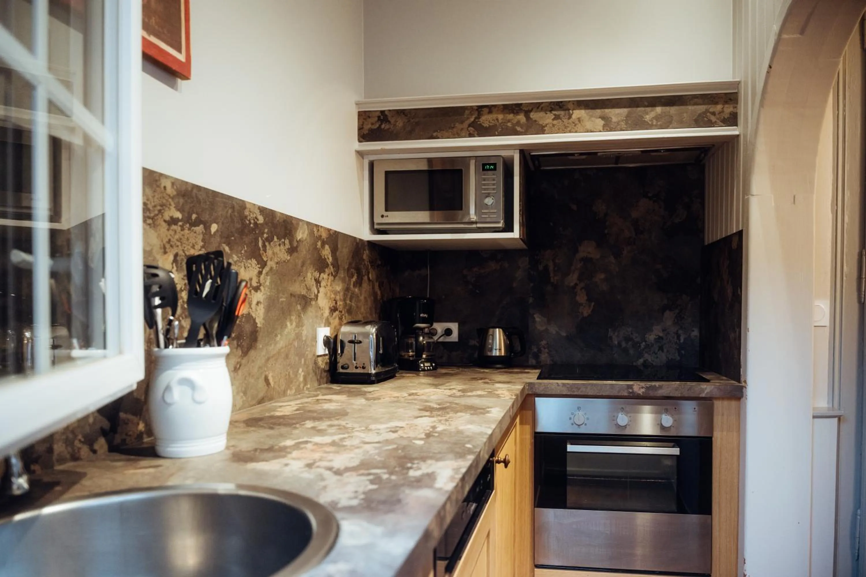 Kitchen or kitchenette in Hotel Le Dauphin