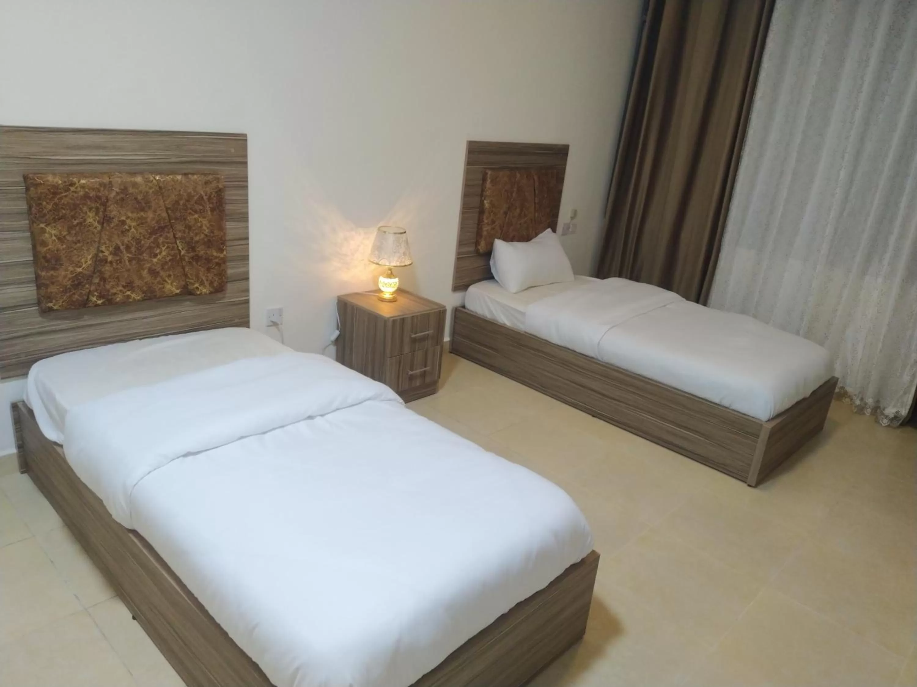 Photo of the whole room, Bed in Rayan Hotel Suites