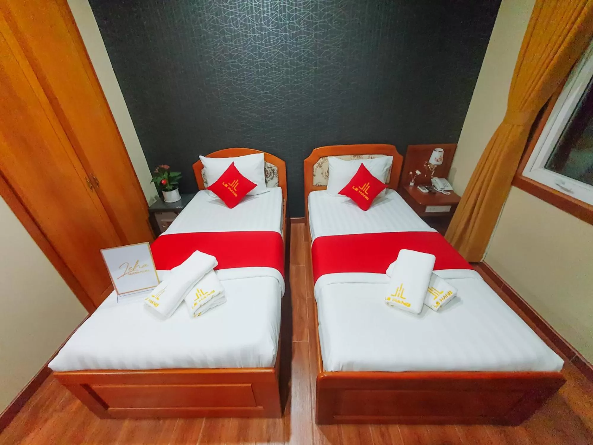 Bed in LEHA Saigon Hotel Airport