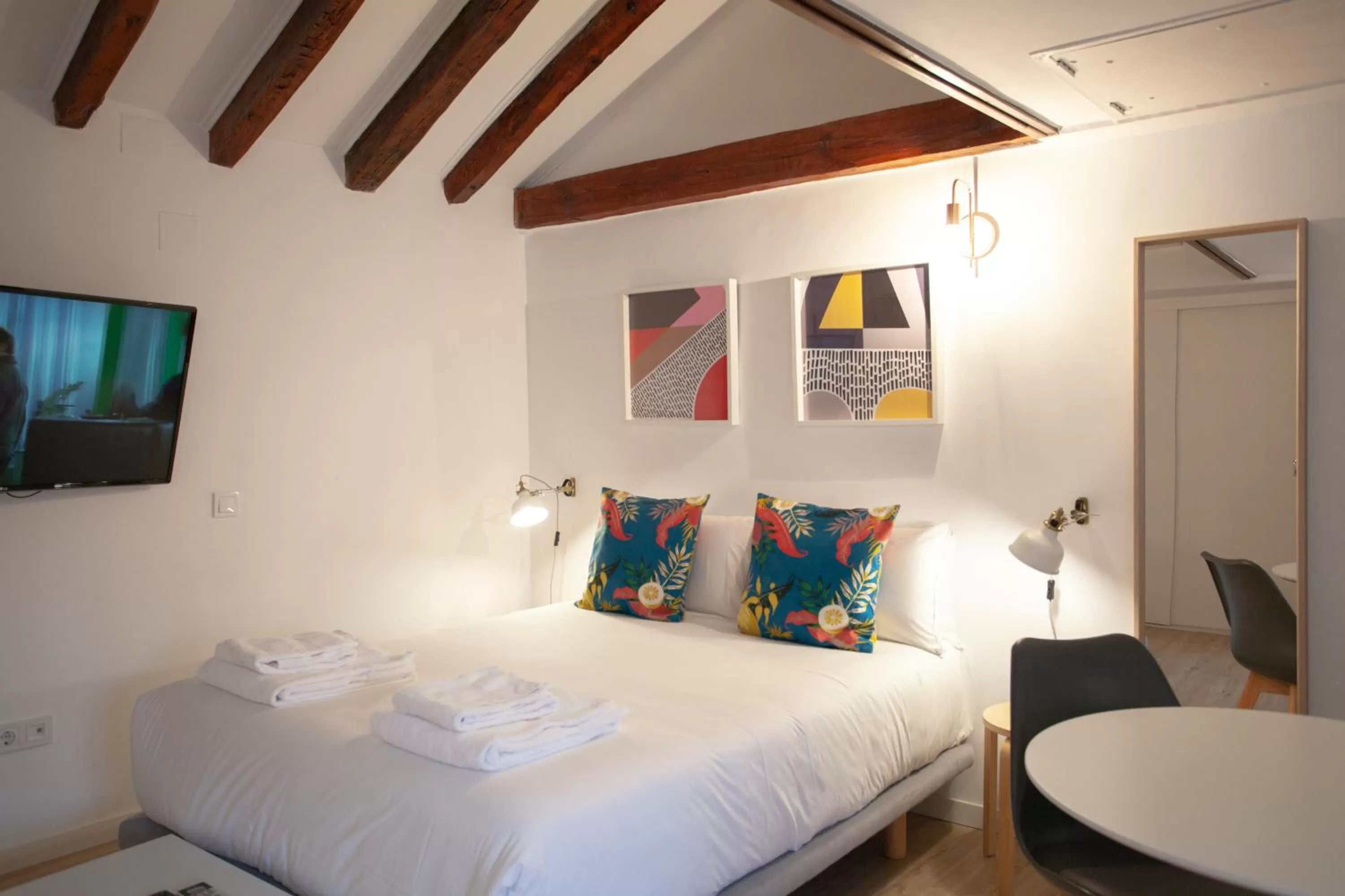 Bed in Gran Central Suites