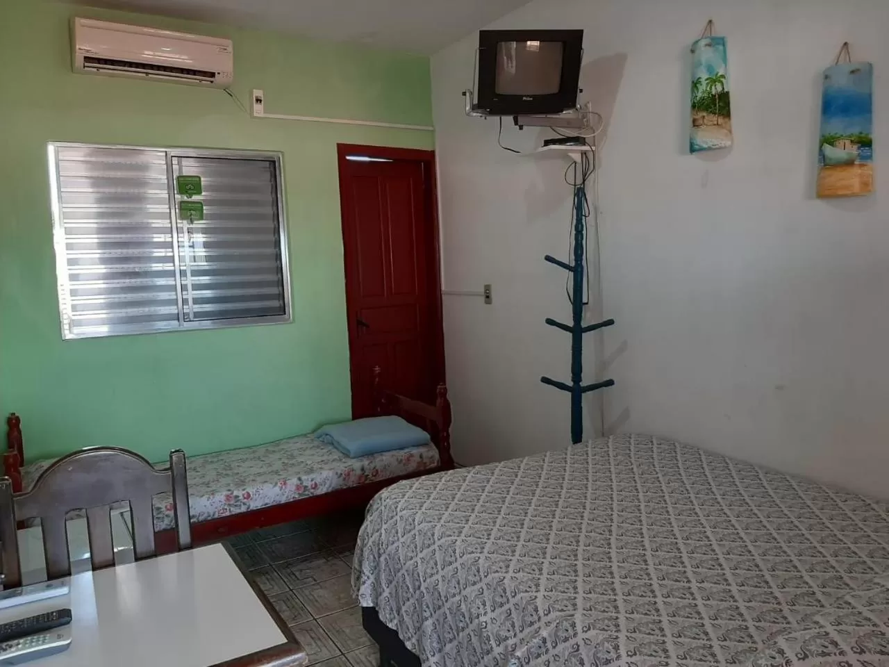 Bed in Pousada Canoas