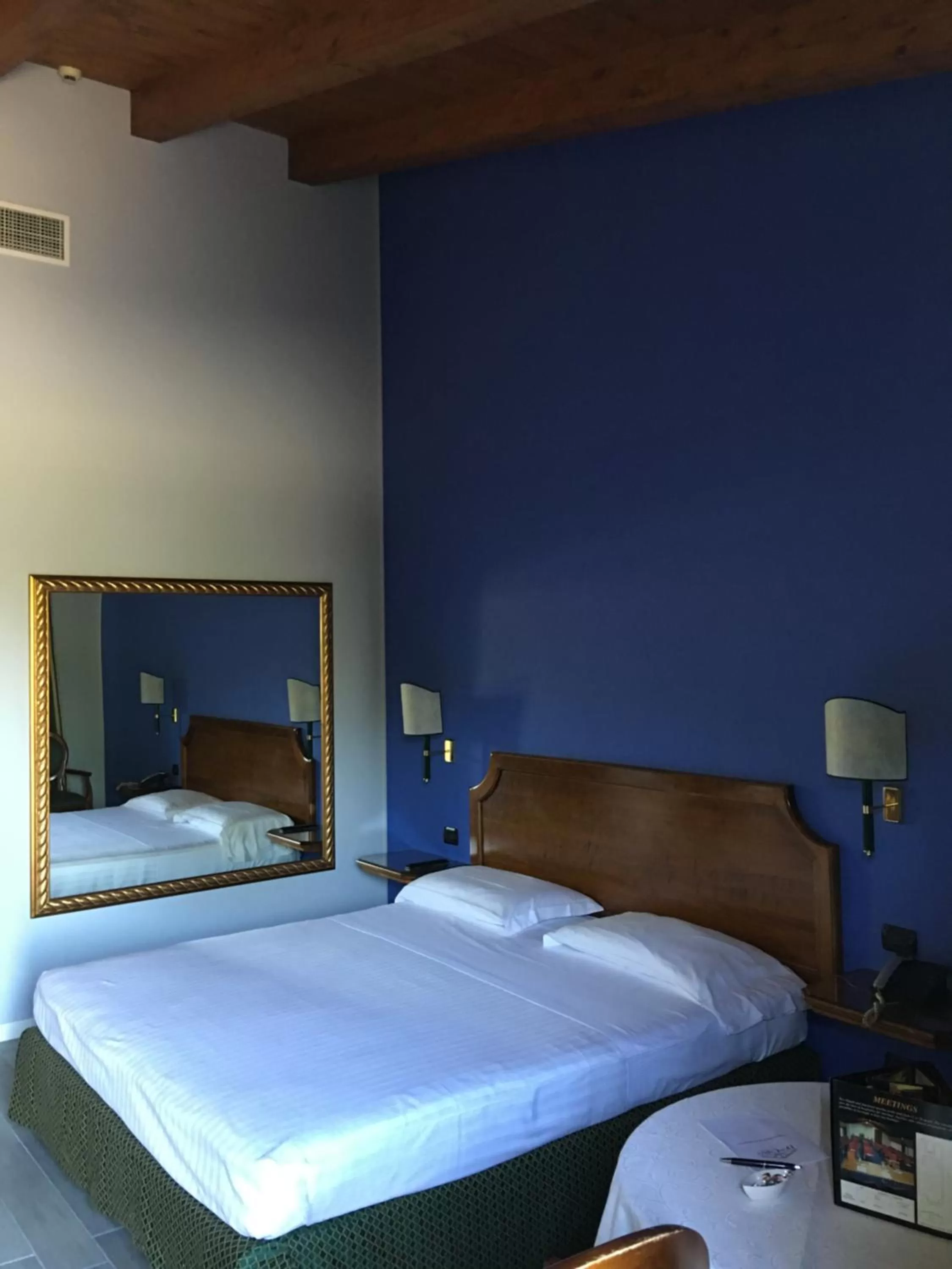 Bed in Hotel Don Carlo