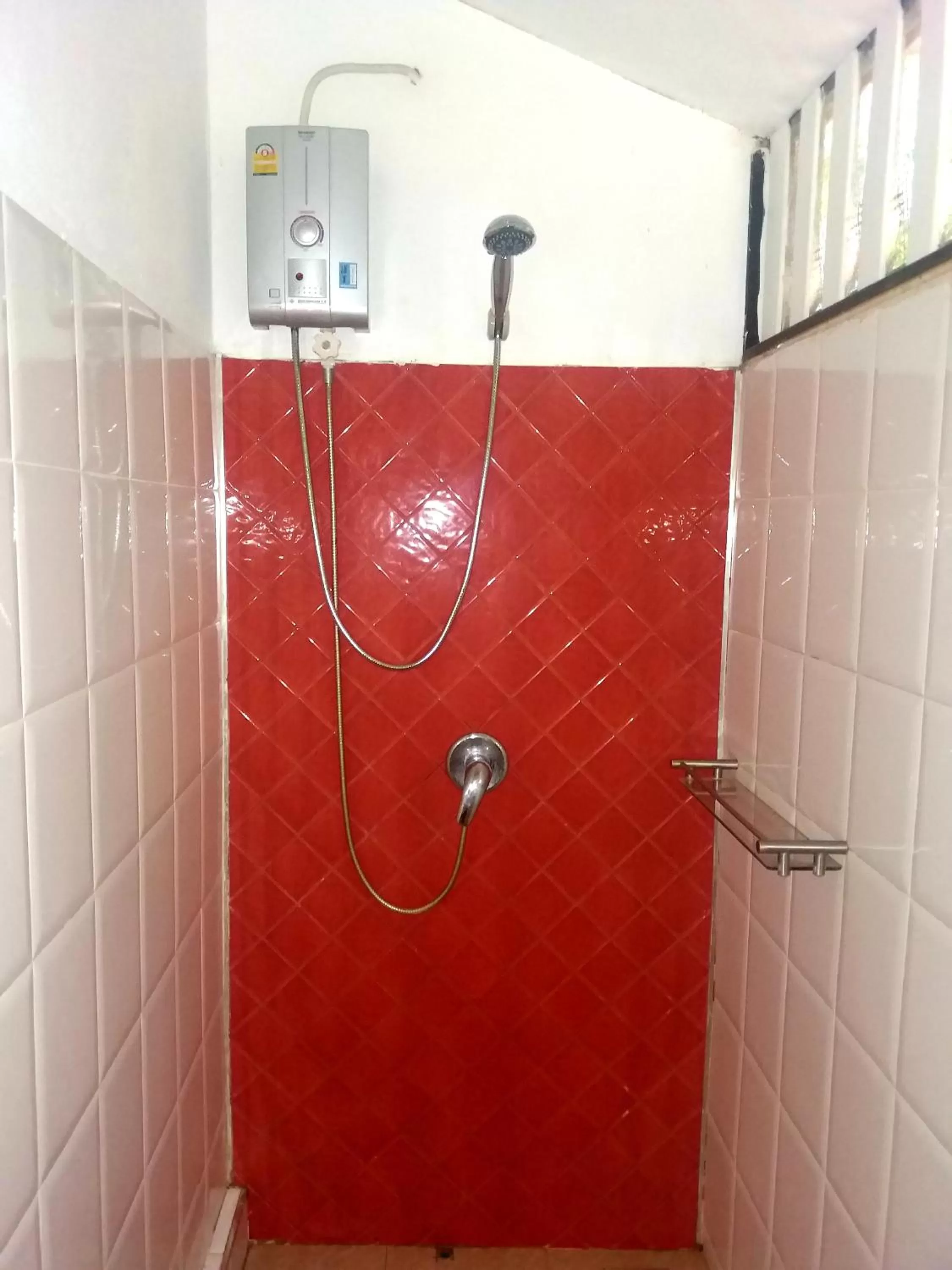 Shower in Thanya Beach Resort - SHA Plus