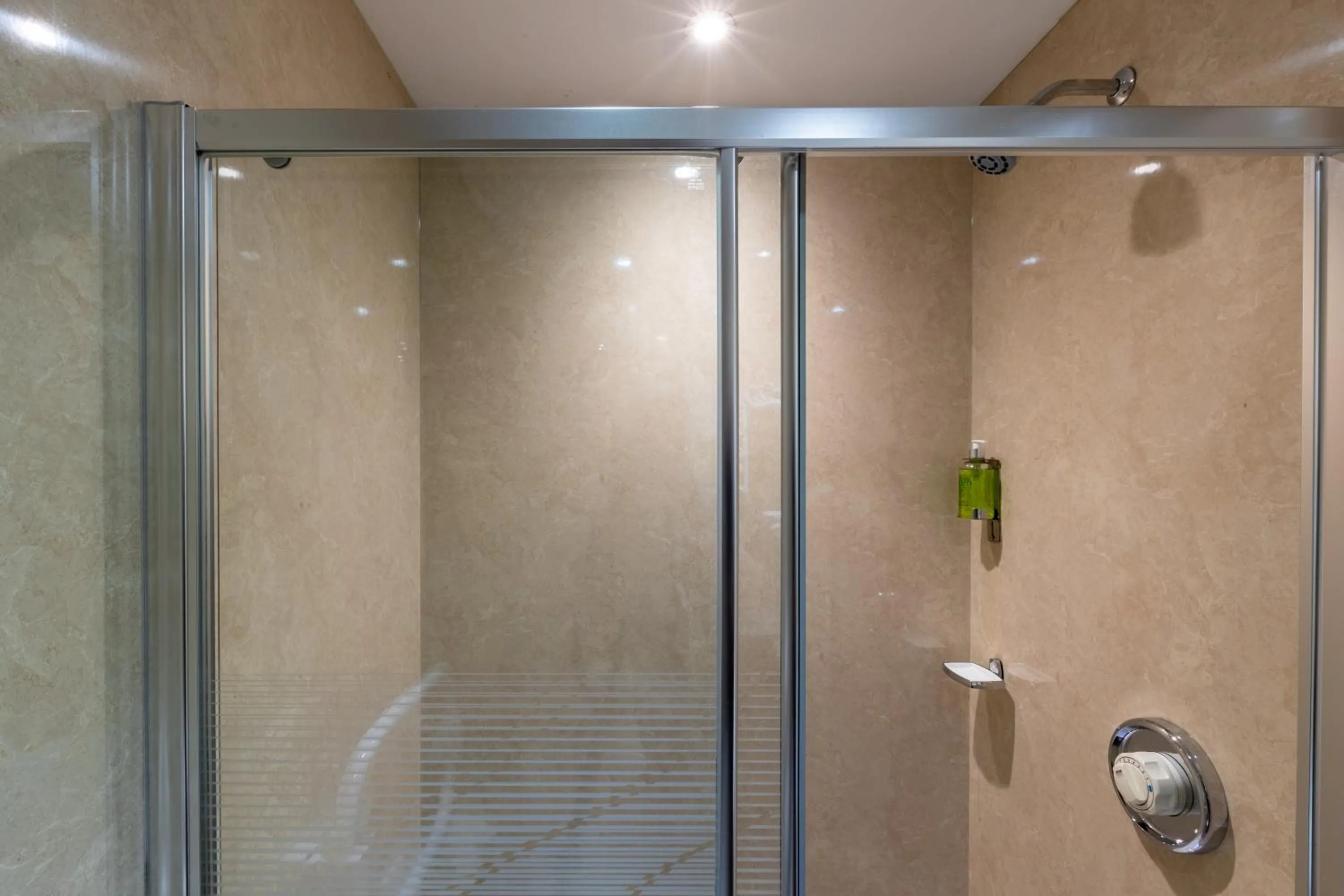 Shower in Holly Lodge Guest House with FREE off site health club