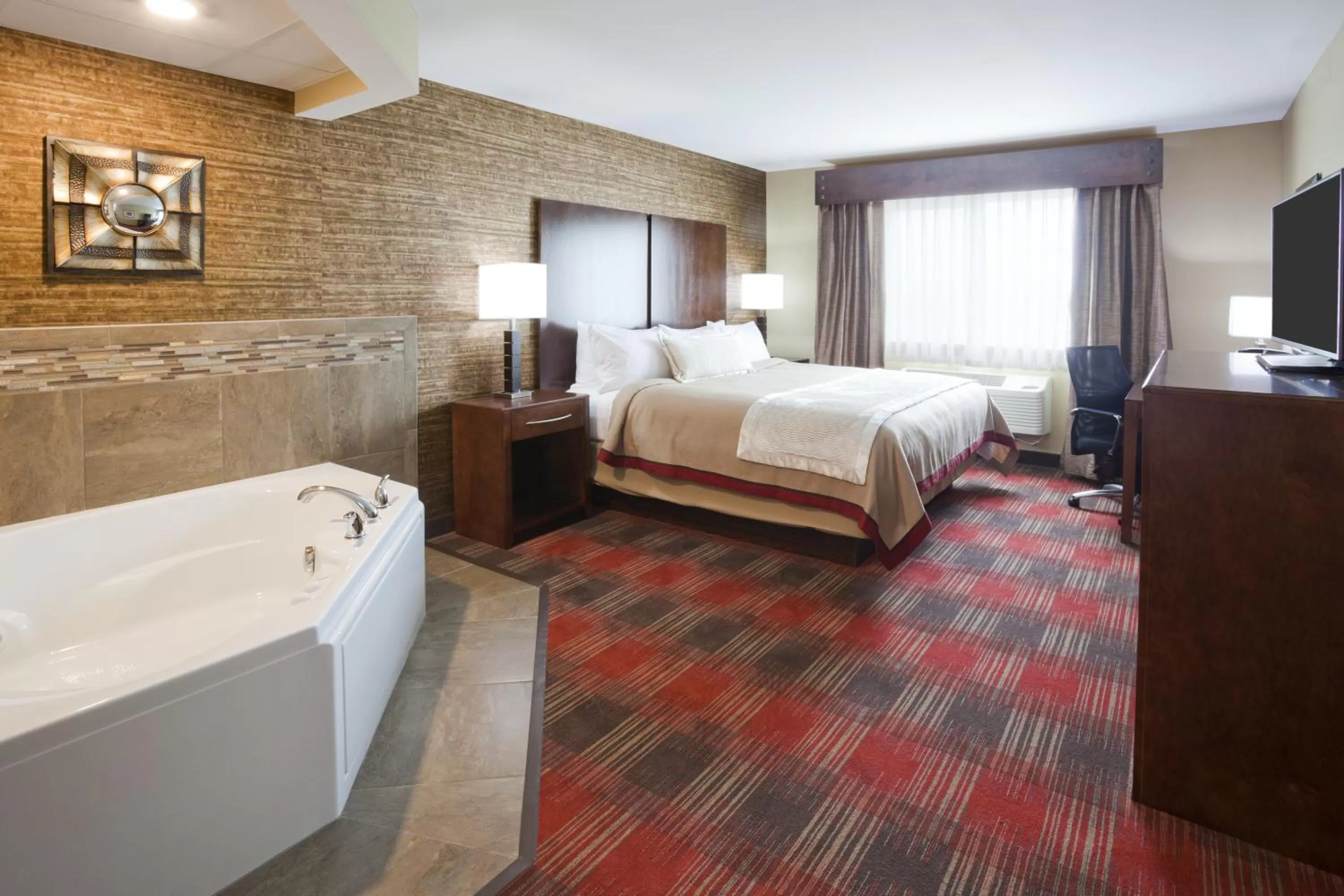 Bed in Gateway Park Hotel and Suites - Sioux Falls -Tea