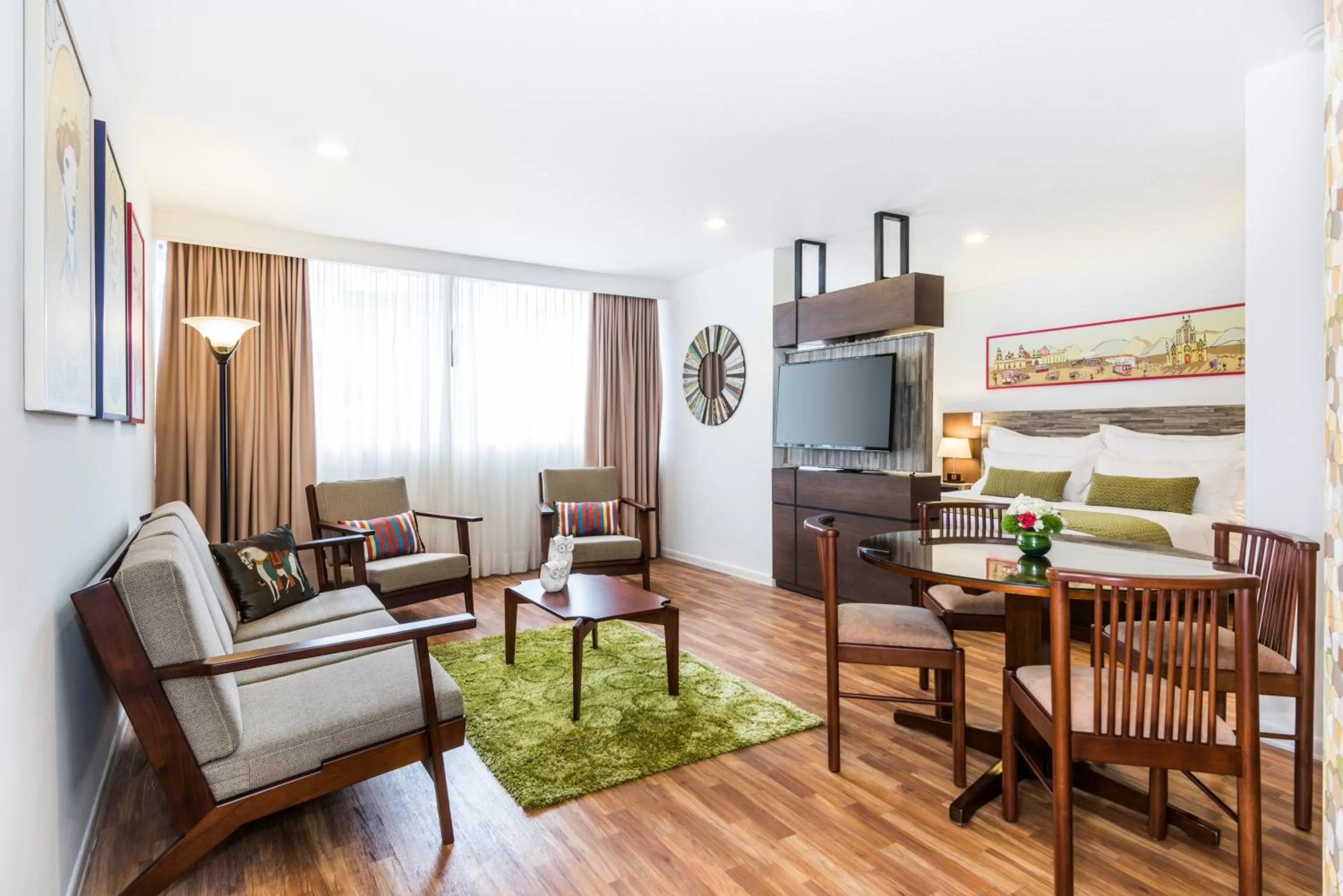 Photo of the whole room in Suites by Vilar América