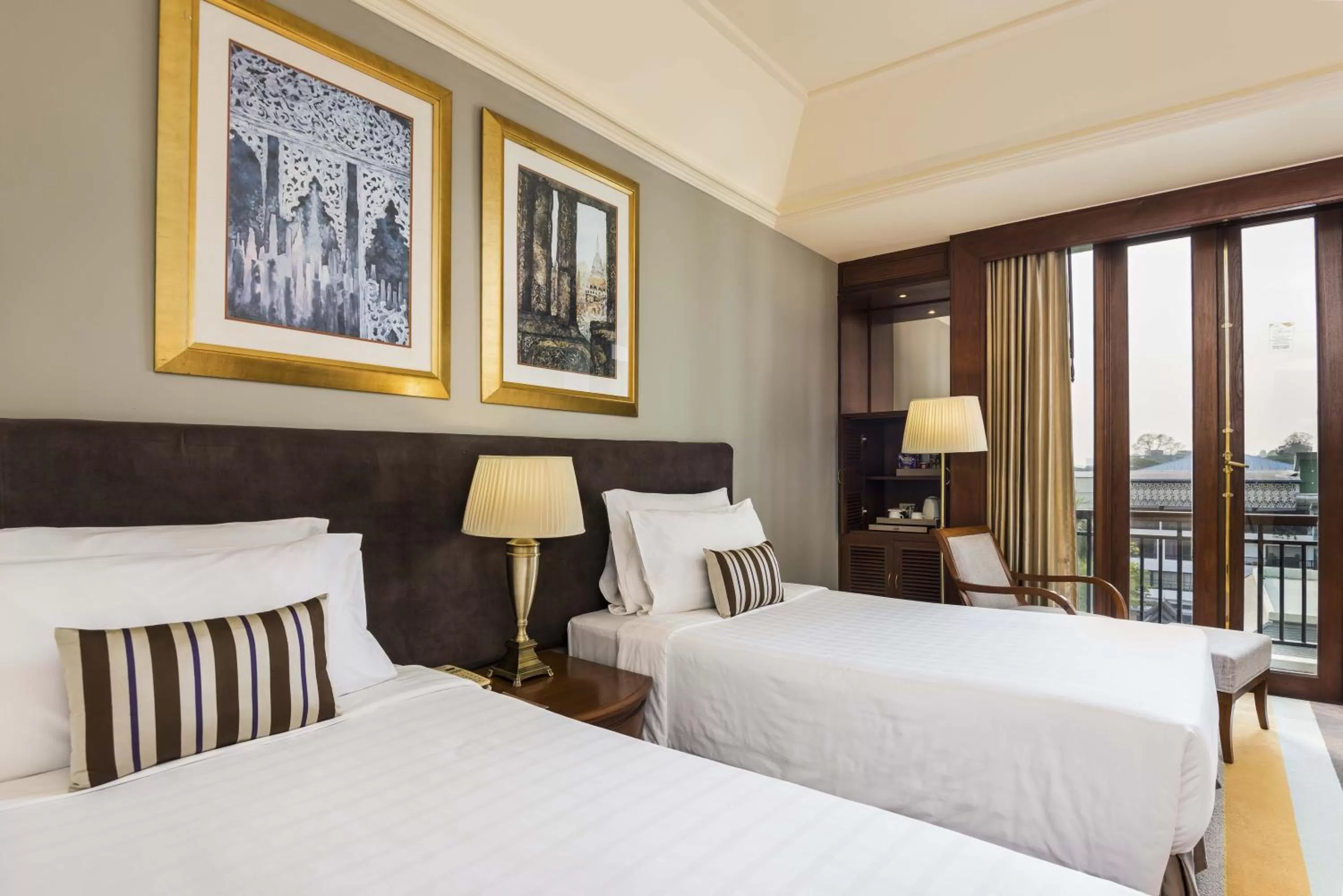 Bed in Chatrium Hotel Royal Lake Yangon