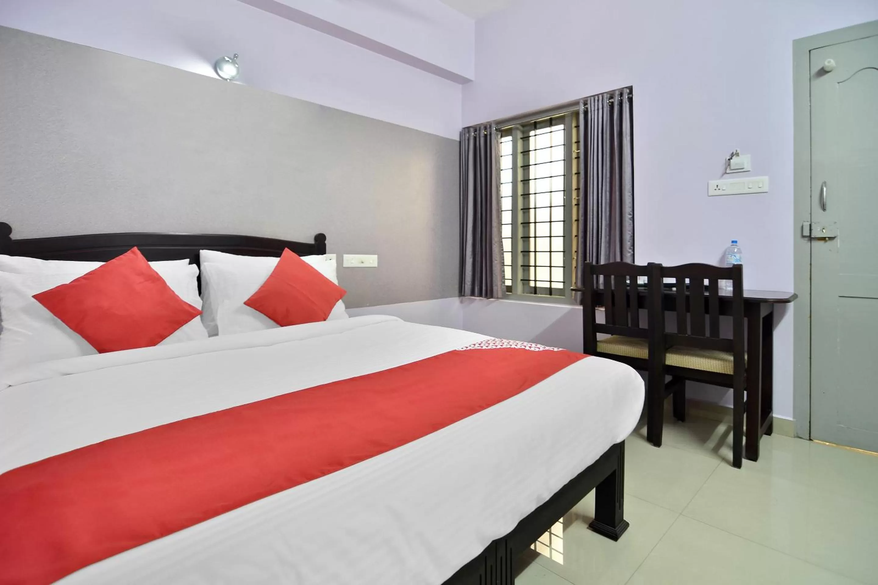Photo of the whole room, Bed in Shanthi Residency