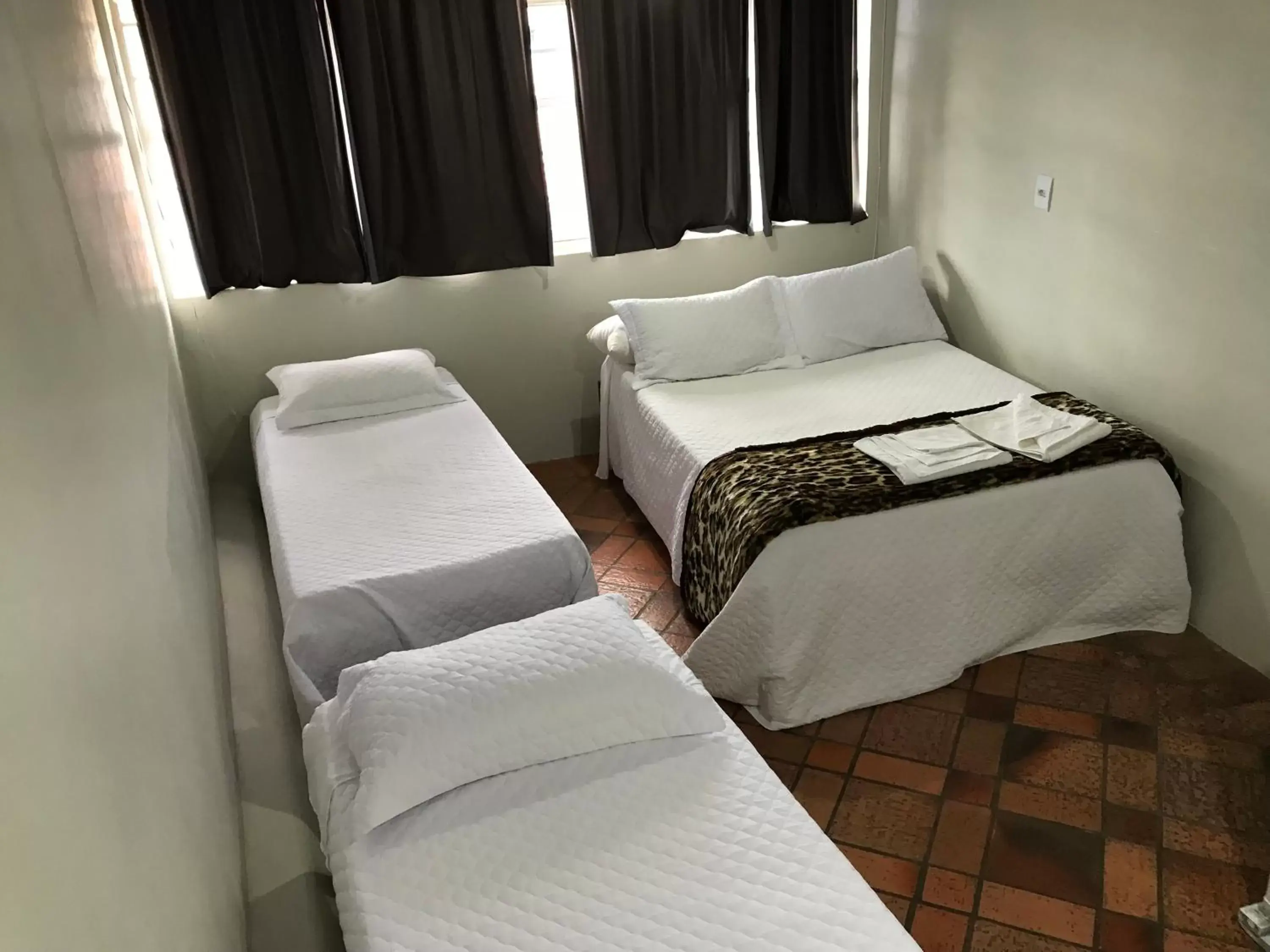 Quadruple Room with Mountain View in Pousada Acayaca Quadruple Room with Mountain View in Pousada Acayaca