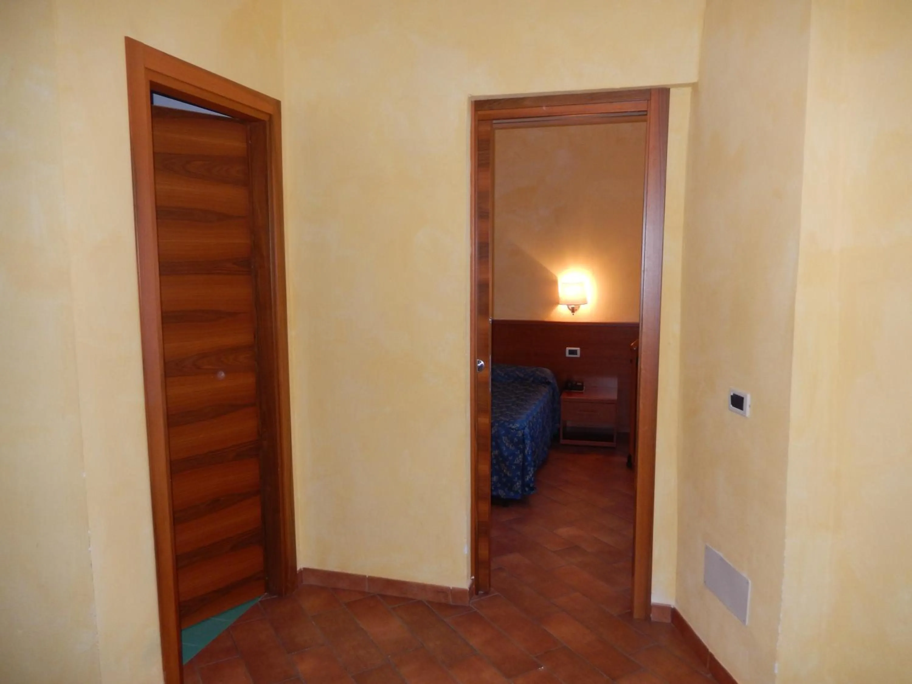 Photo of the whole room, Bed in Albergo Dei Leoni