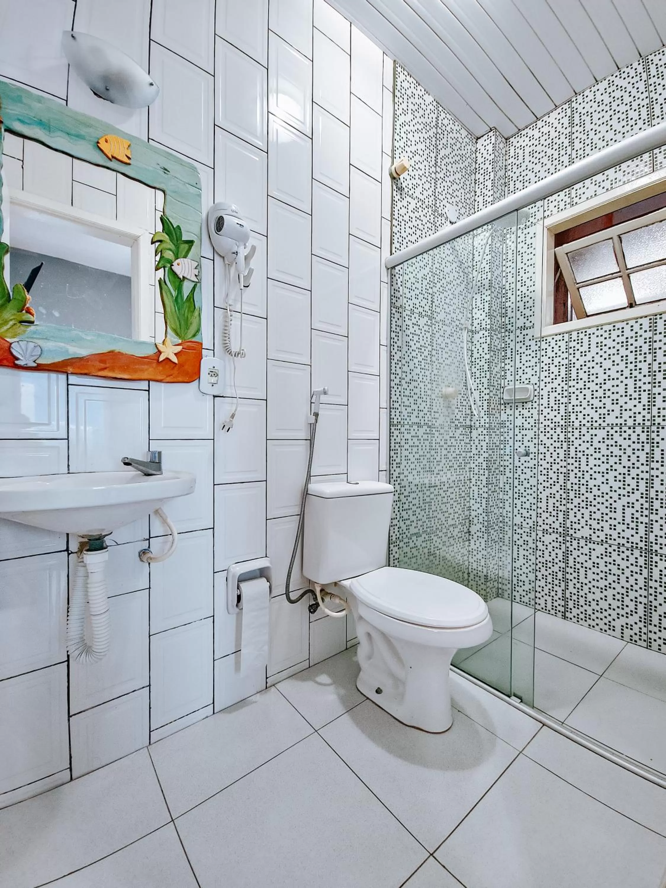 Bathroom in Suítes Água Marinha