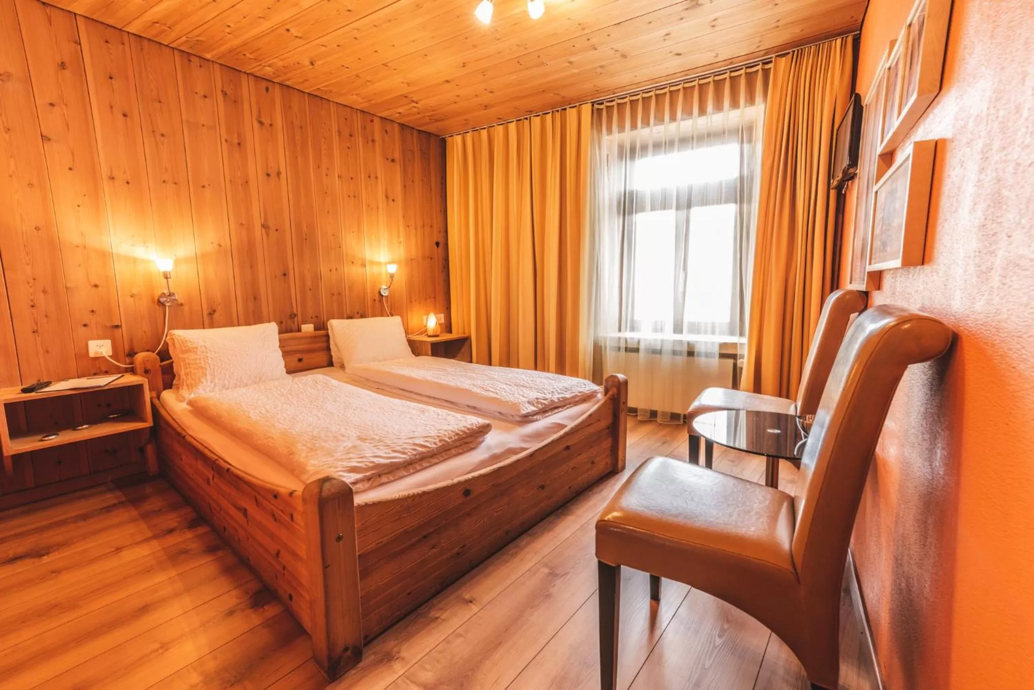 Photo of the whole room, Bed in CURUNA Hotel-Garni