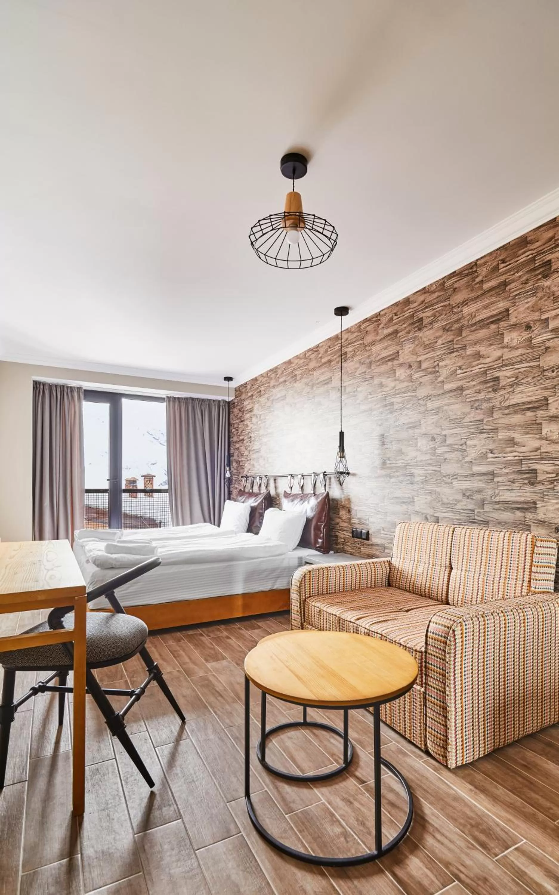 Photo of the whole room, Bed in Gudauri Loft Hotel