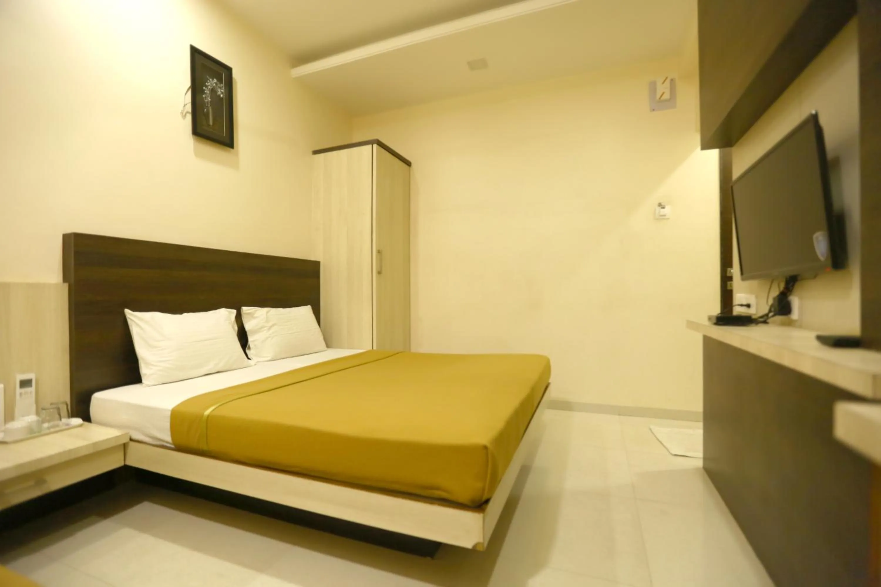 Bed in Hotel Madhuri Executive