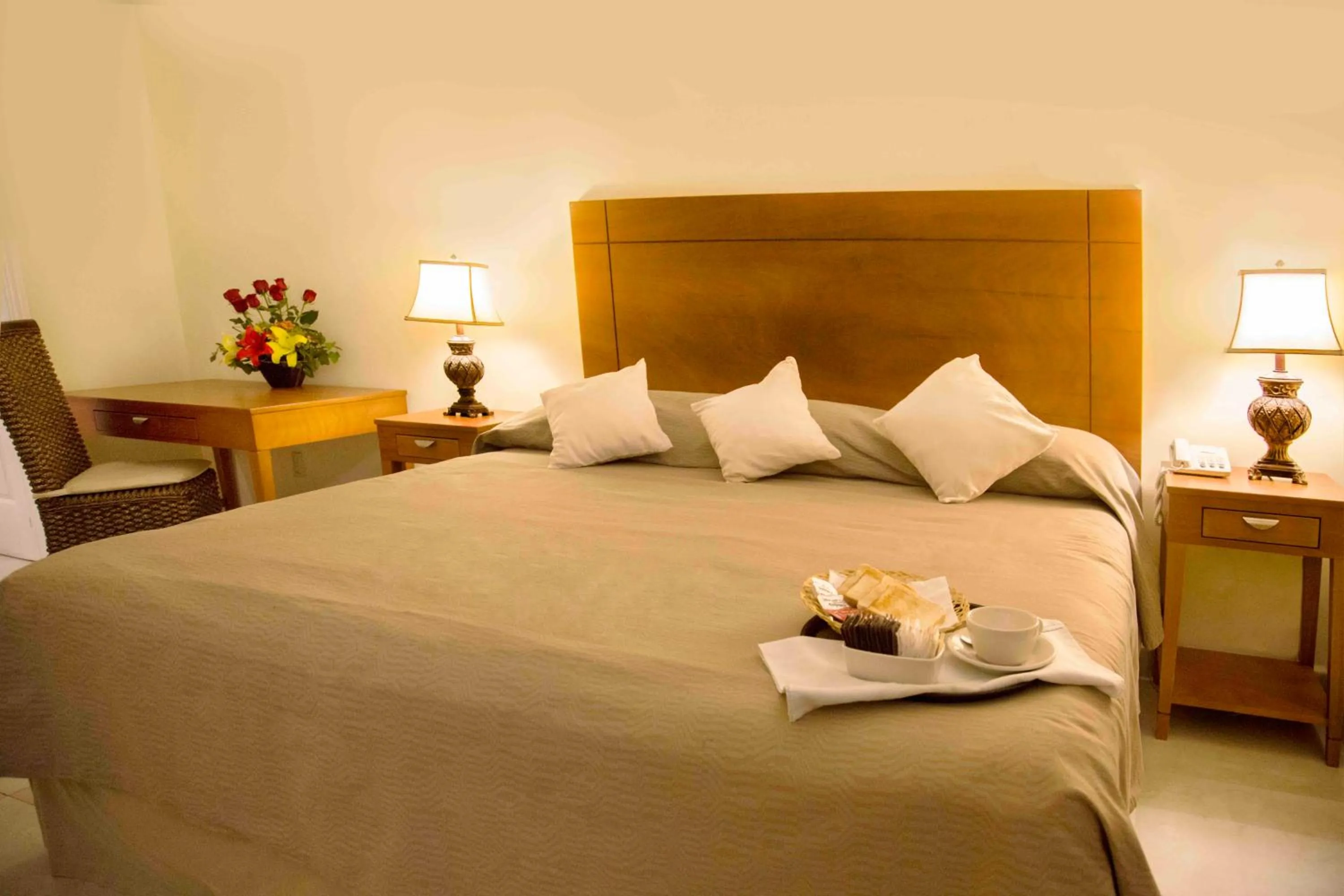 Bed in Hotel Arenas del Mar Resort