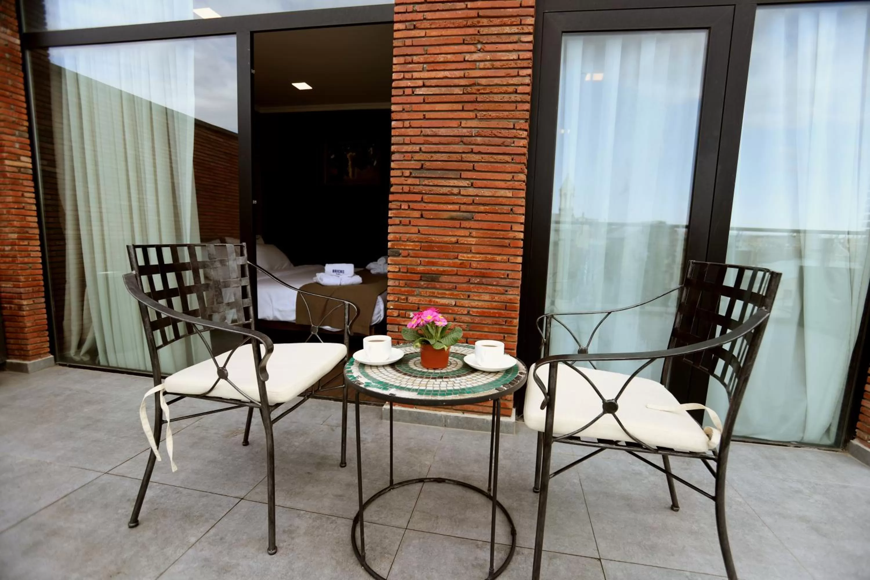 Balcony/Terrace, Dining Area in Bricks Hotel