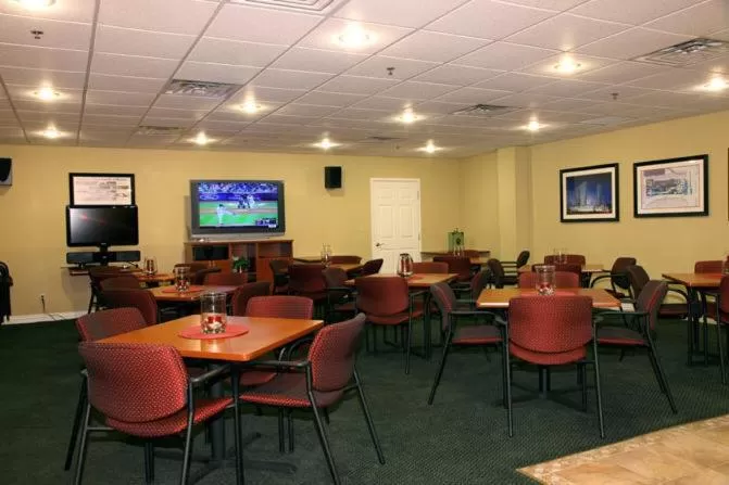 Communal lounge/ TV room in Jockey Club Suites