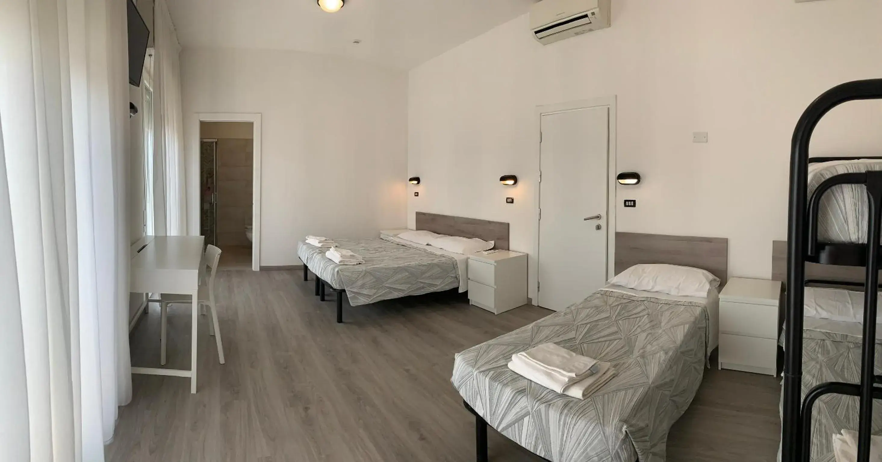 Superior Quadruple Room in Hotel Laika Superior Quadruple Room in Hotel Laika